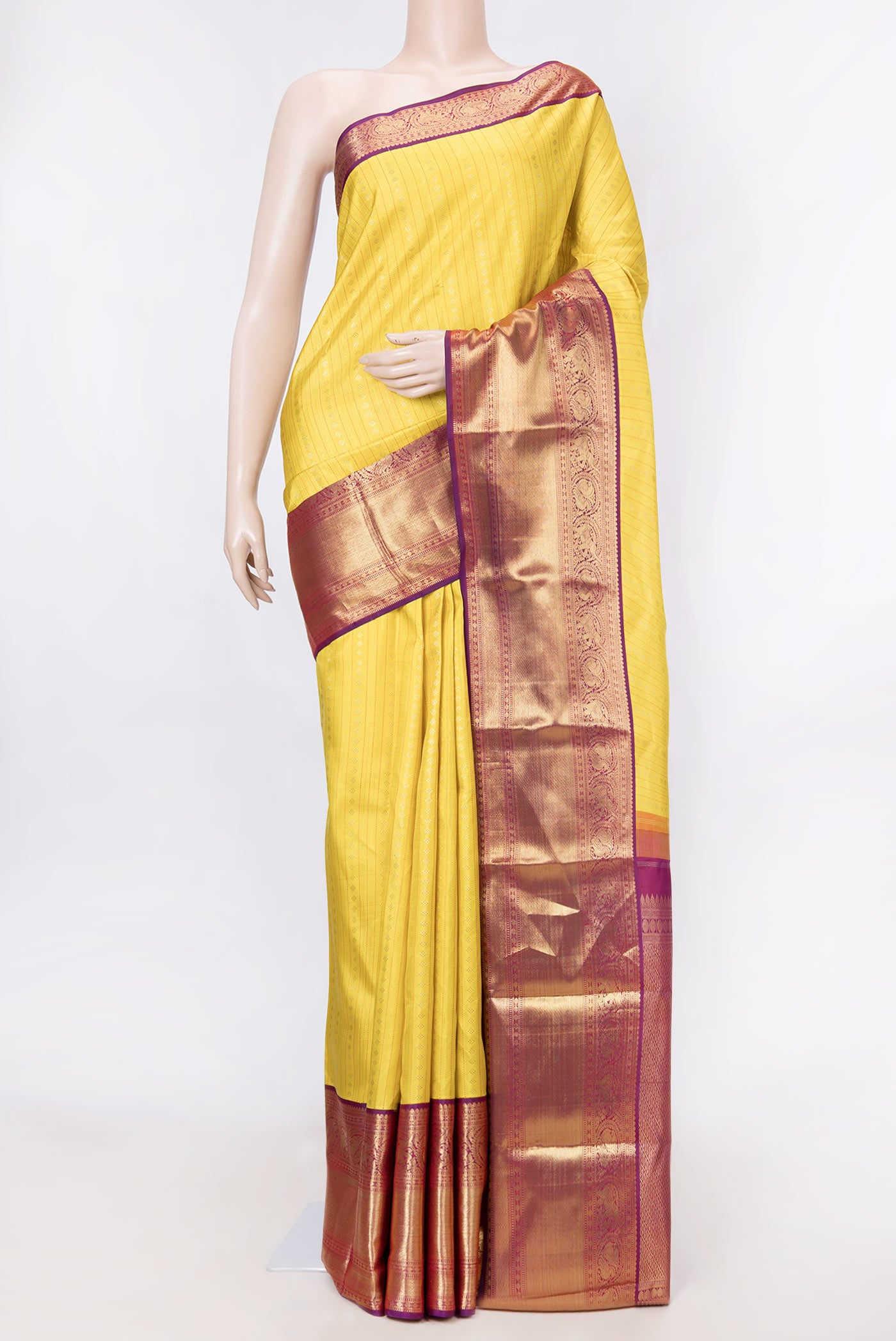 Pure Silk Pure Zari Yellow Dual Tone Kanchipuram Saree with Zari Brocade on the body and Zari Border displayed on a mannequin