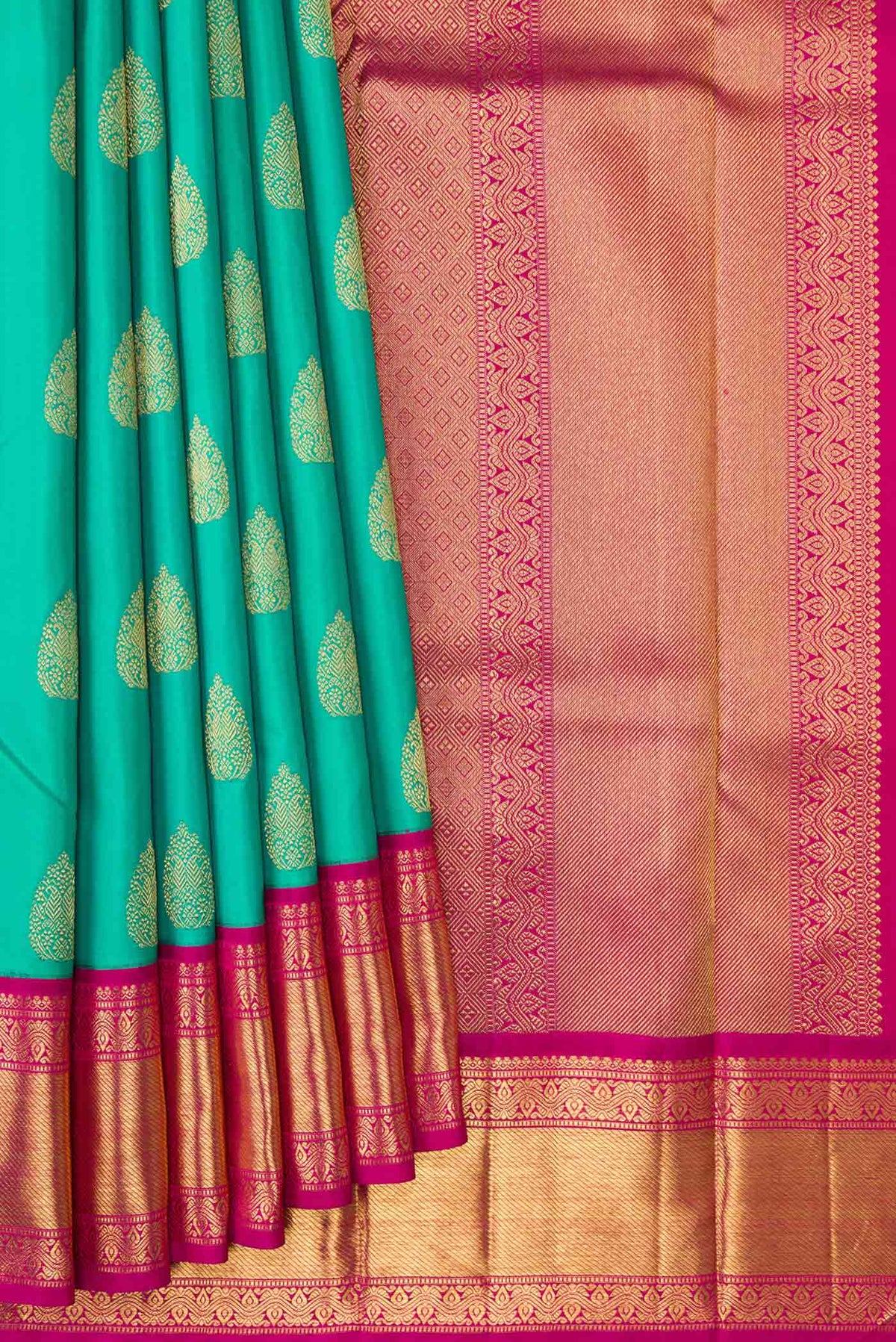 Pleats and pallu of Pure Silk Pure Zari Sea Green Dual Tone Kanchipuram Saree with Zari Butta on the body and Zari Border
