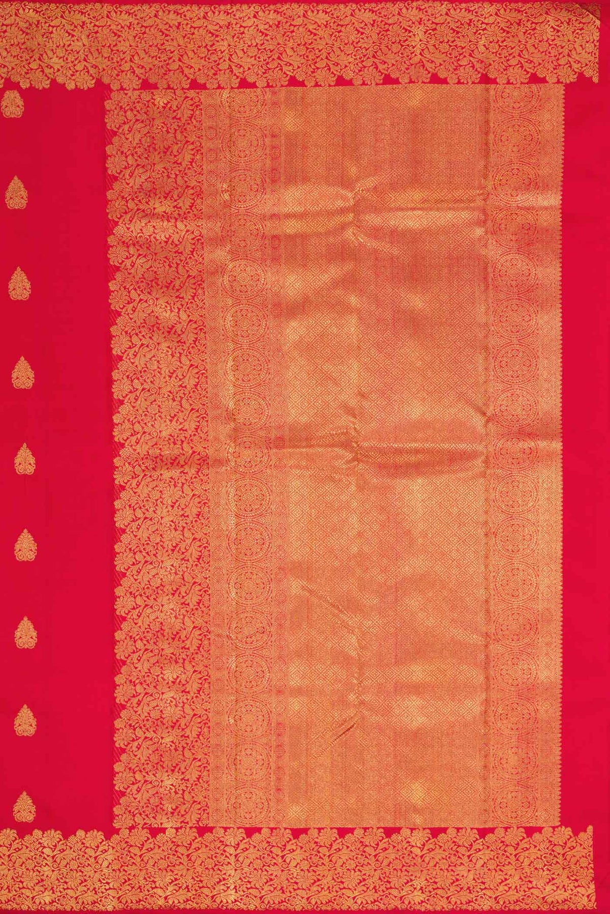 Close up image of the pallu of Pure Silk Pure Zari Red Dual Tone Kanchipuram Saree with Zari Butta on the body and Zari Border