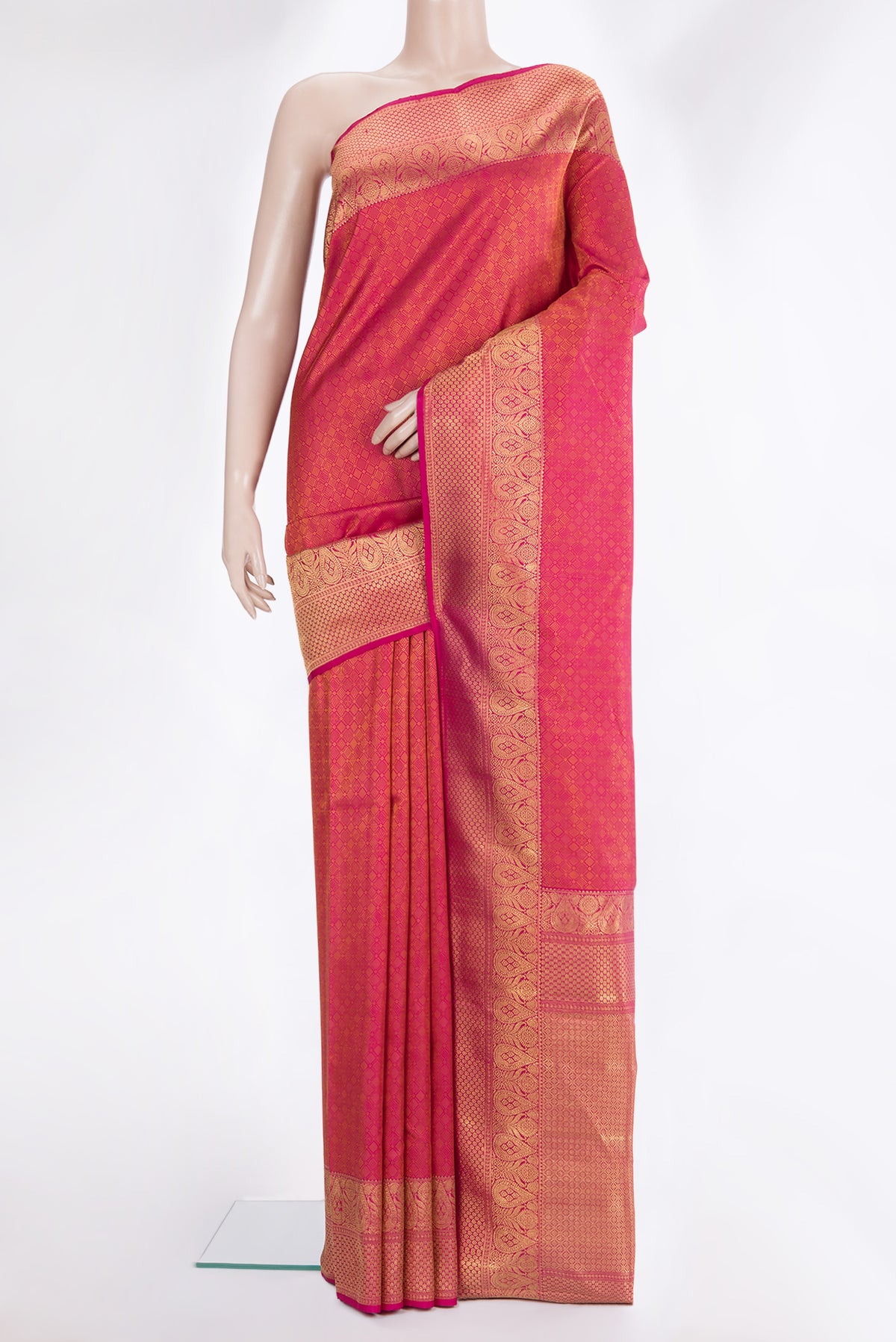 Pure Silk Pure Zari Pink Kanjivaram Saree with Jacquard design on the body and Fancy Border.  displayed on a mannequin