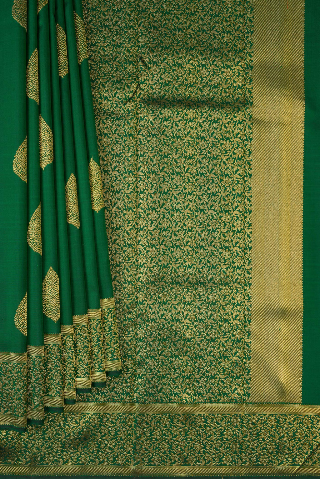 Pleats and pallu of Pure Silk Pure Zari Green Kanjivaram Saree with Zari Butta on the body and Fancy Border. 