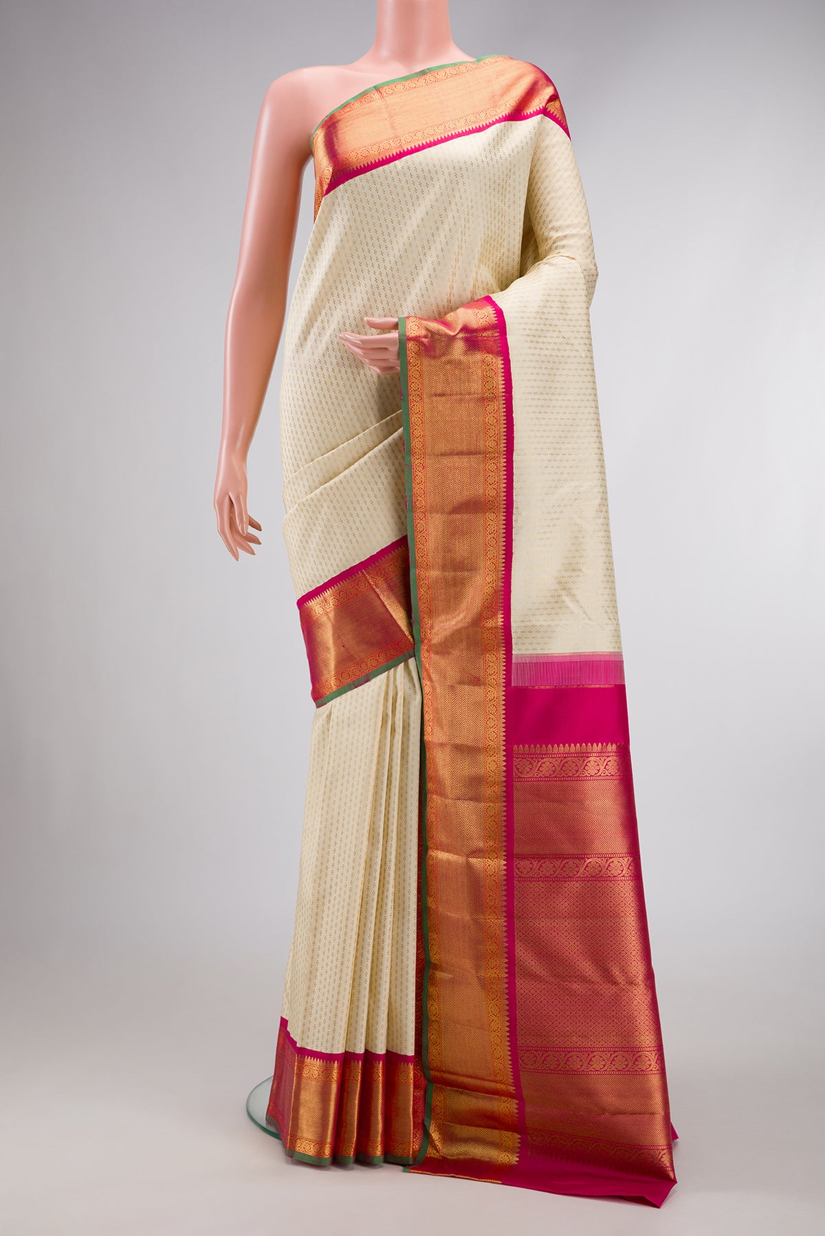 Pure Silk Pure Zari Sandal Dual Tone Kanjivaram Saree with Zari Brocade on the body and Zari Border.  displayed on a mannequin