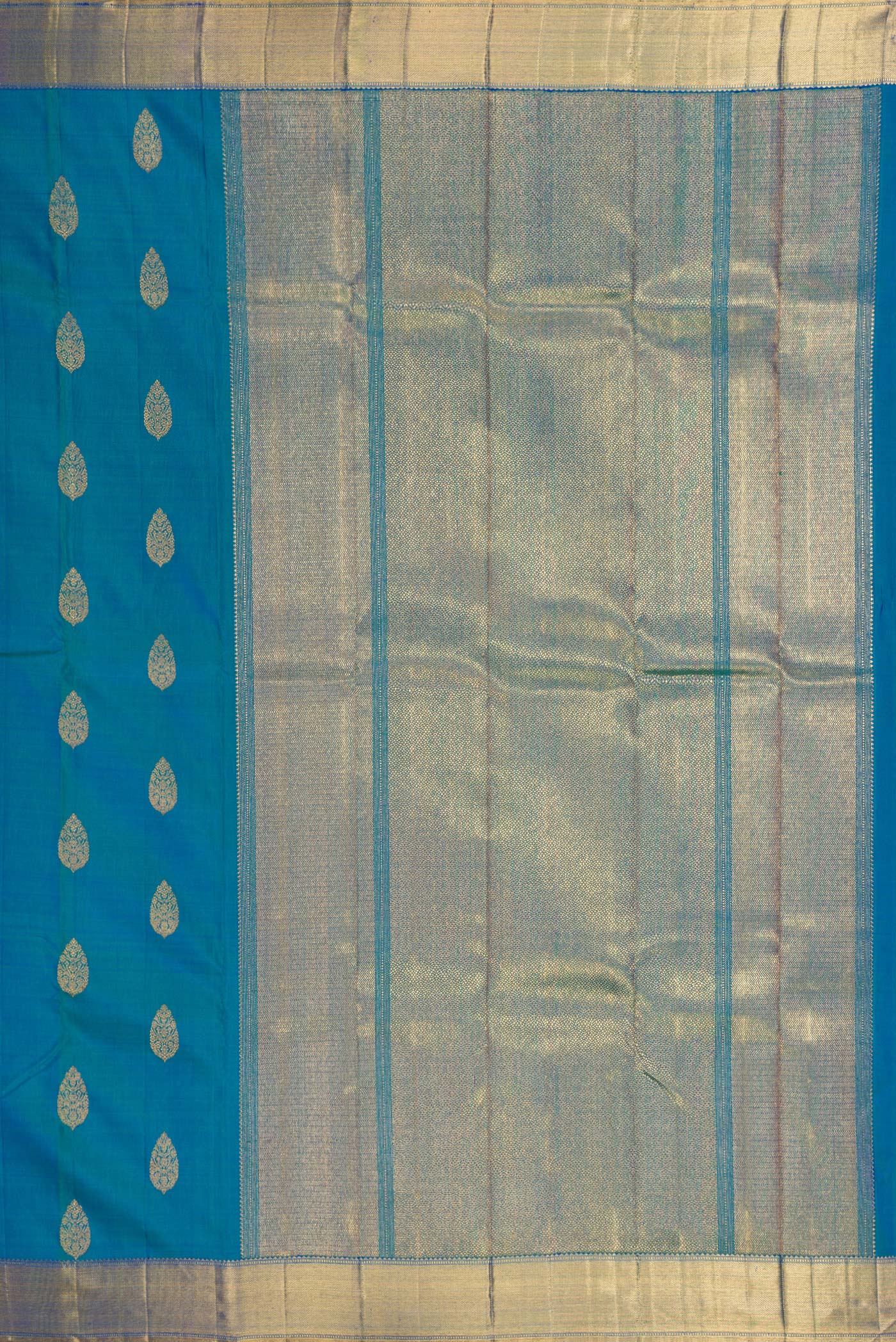 Close up image of the pallu of Pure Silk Pure Zari Peacock Blue Dual Tone Kanjivaram Saree with Zari Butta on the body and Zari Border. 