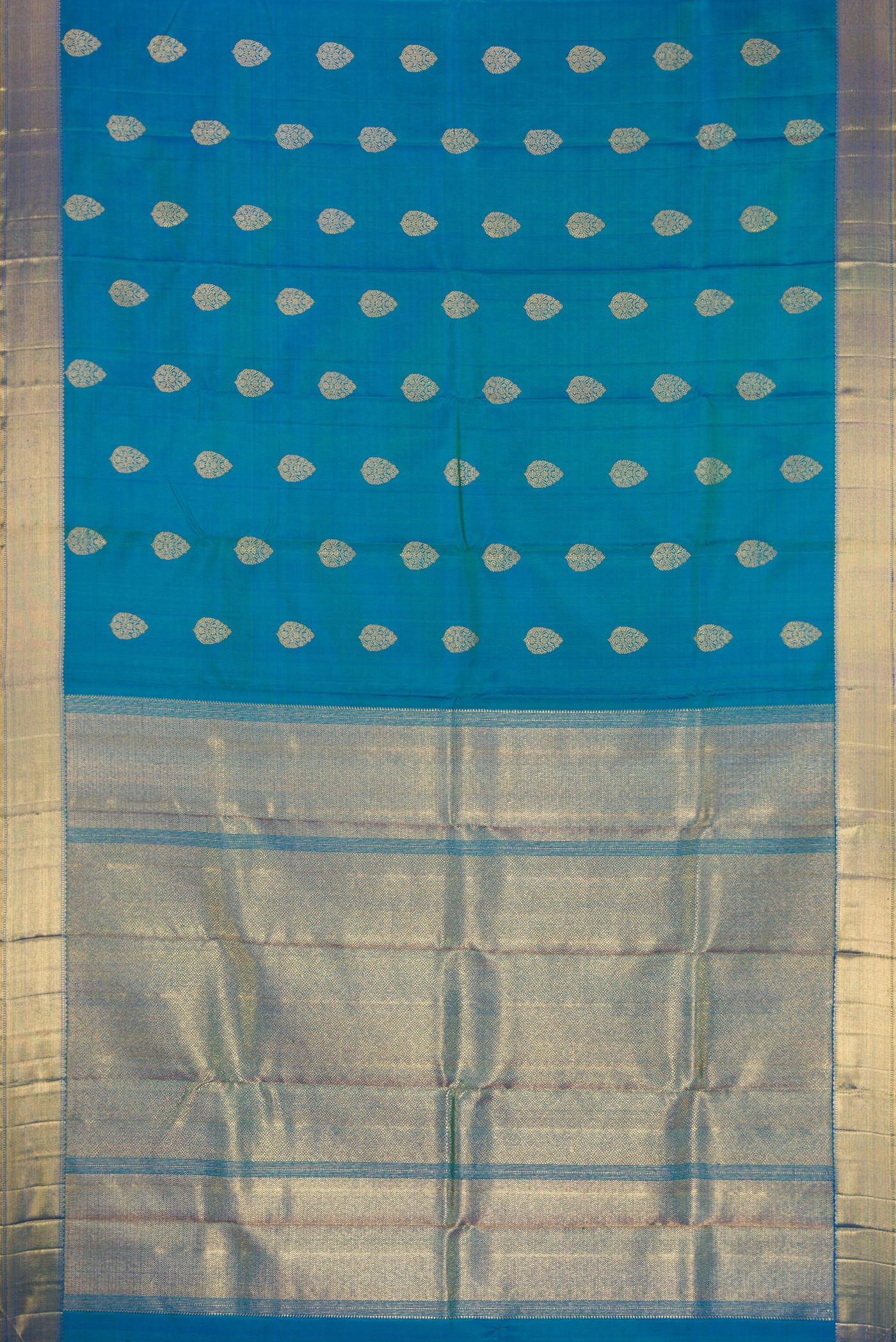 Flat view of Pure Silk Pure Zari Peacock Blue Dual Tone Kanjivaram Saree with Zari Butta on the body and Zari Border. 