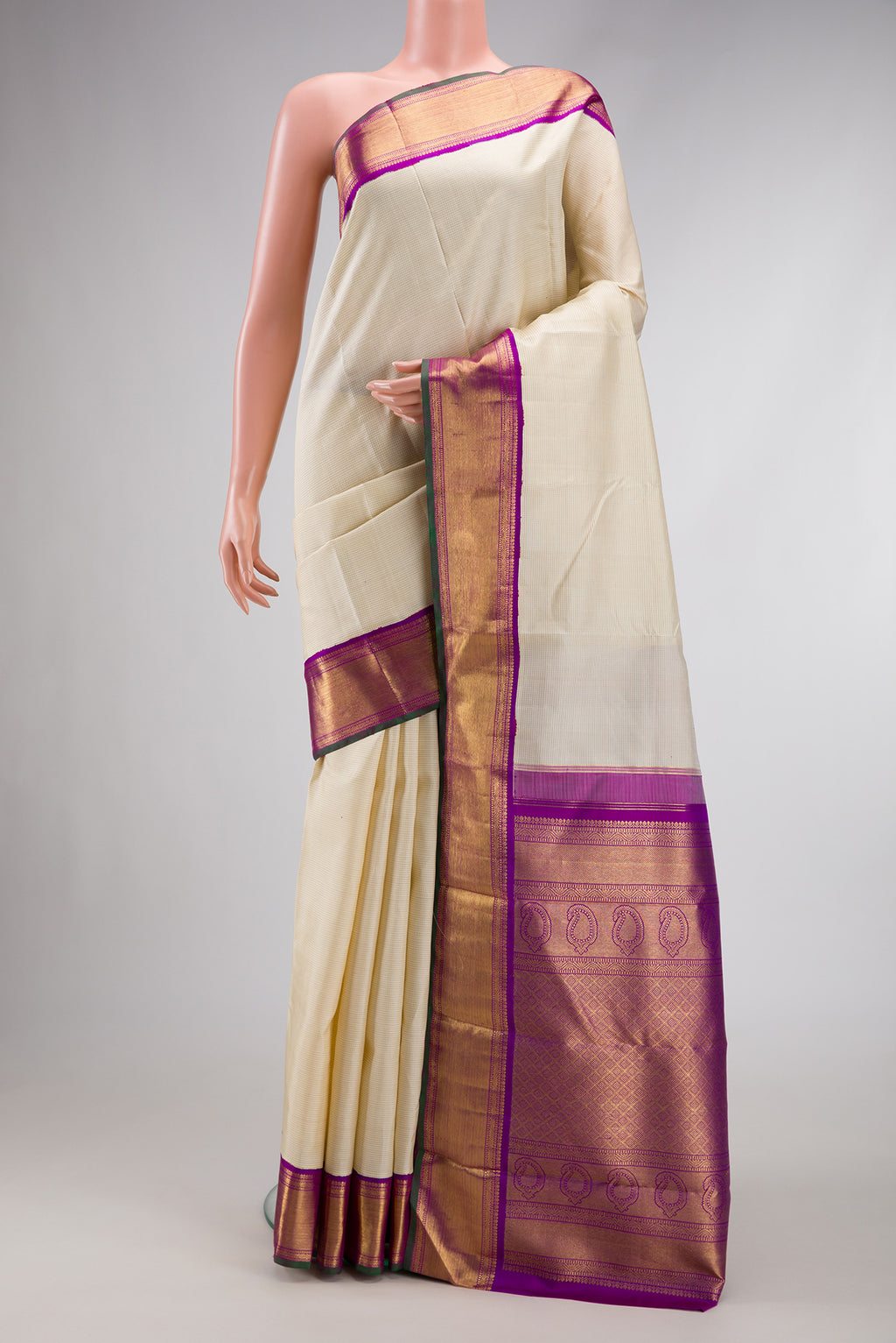 Pure Silk Pure Zari Off White Dual Tone Kanjivaram Saree with Stripes on the body and Zari Border.  displayed on a mannequin