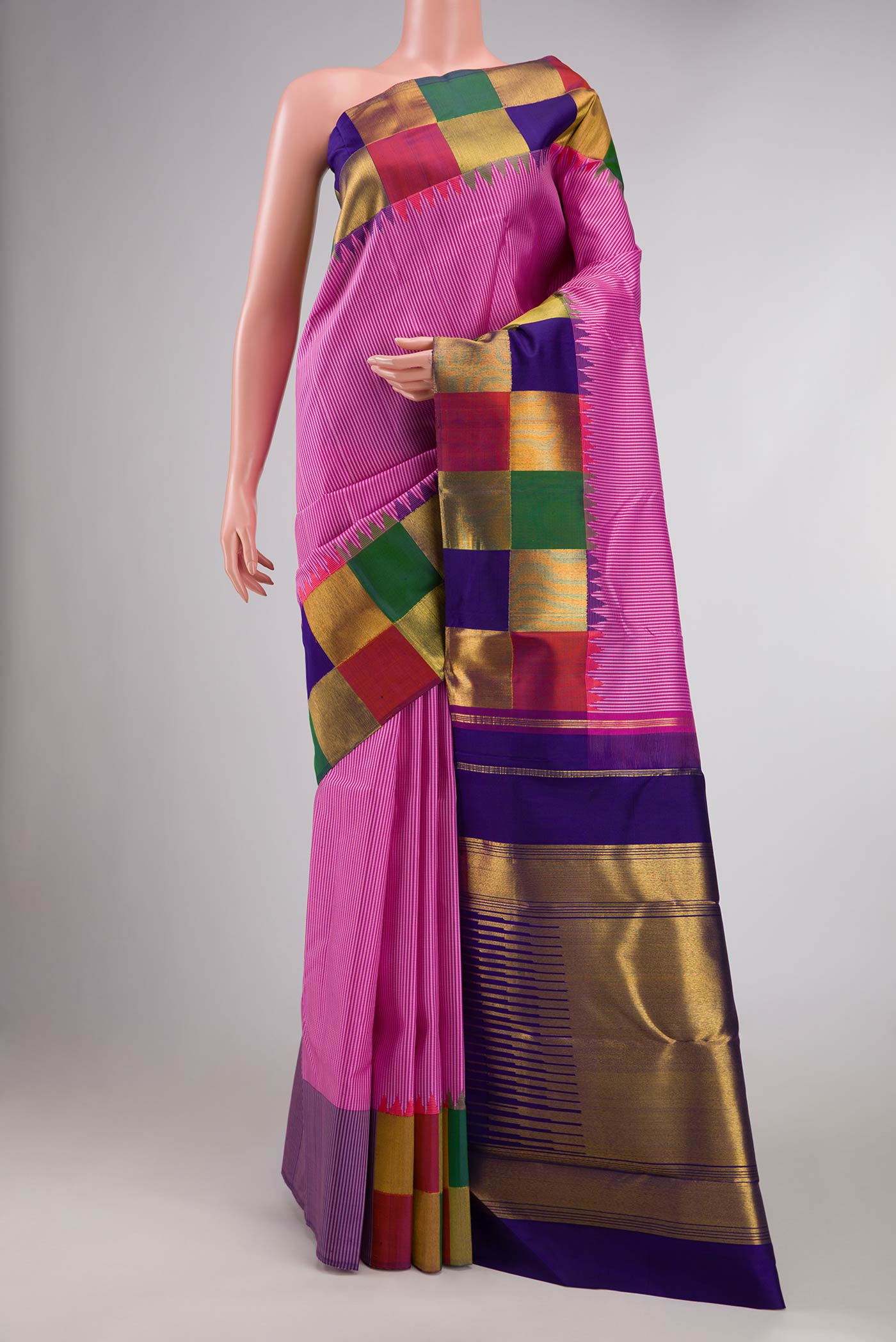 Pure Silk Pure Zari Pink Dual Tone Kanchipuram Saree with Checked design on the body and Fancy Border displayed on a mannequin