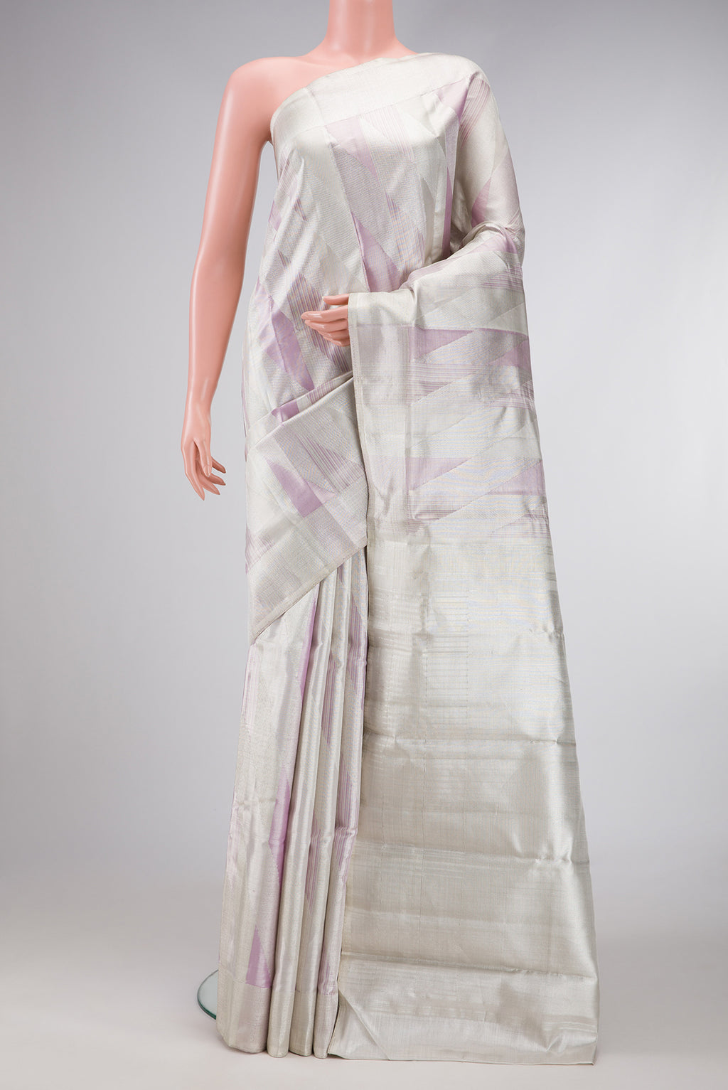 Silver Dual Tone Kanjivaram Tissue Silk Saree with Zari Brocade on the body and Zari Border.  displayed on a mannequin