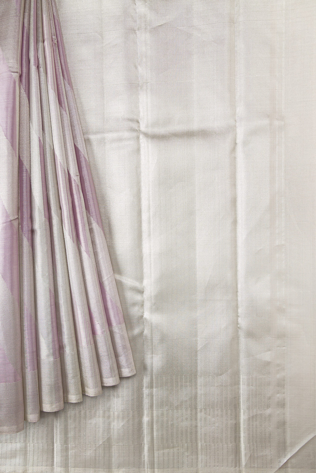 Pleats and pallu of Silver Dual Tone Kanjivaram Tissue Silk Saree with Zari Brocade on the body and Zari Border. 