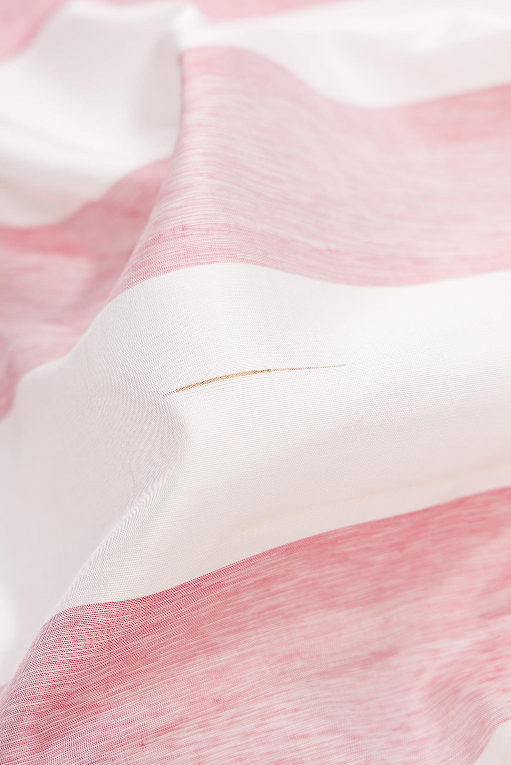 Close up of Off White and Maroon Color Kanjivaram Silk Saree with Stripes on the body and Thin Zari Line.  displaying folds