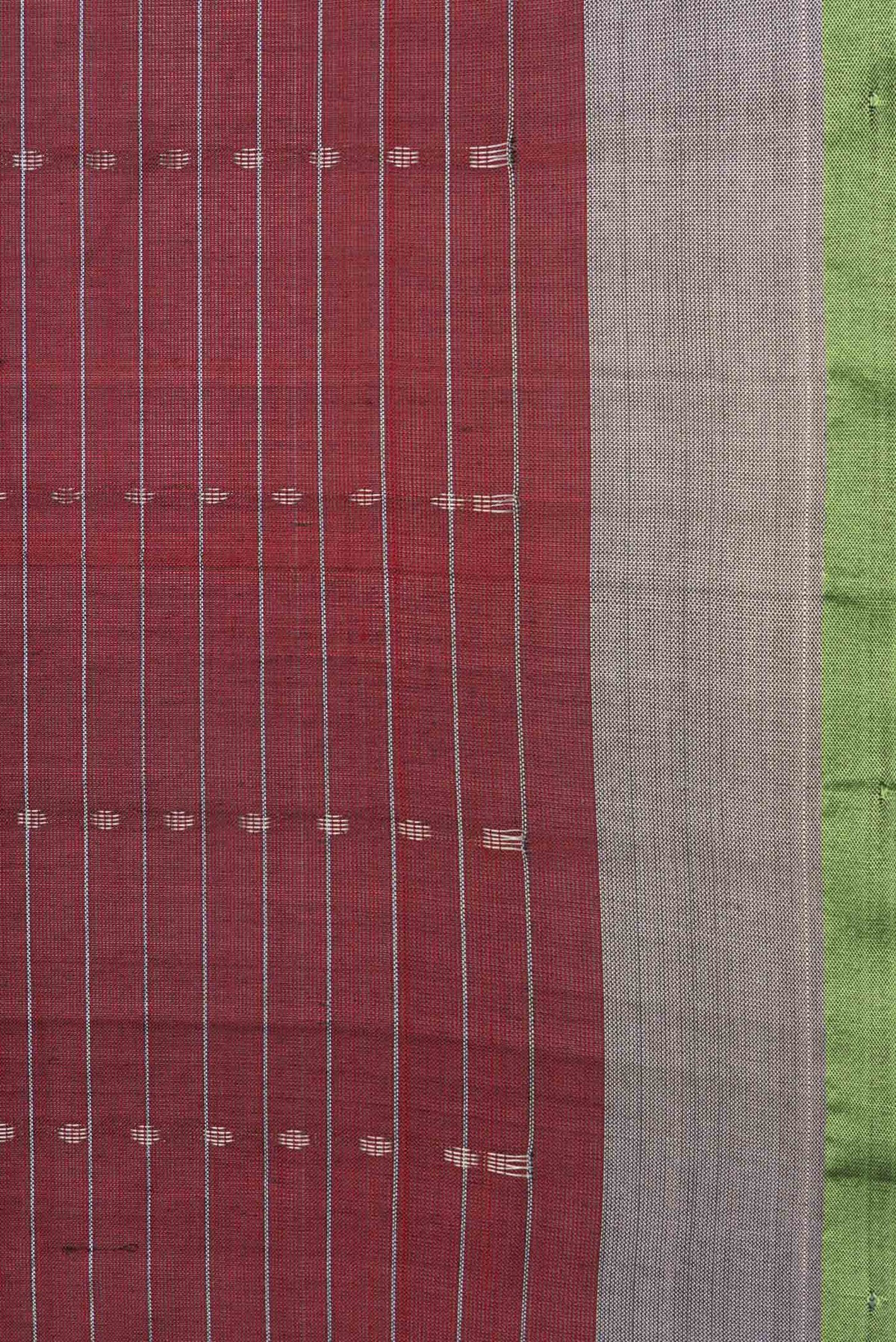 Border image of Maroon Dual Tone Uppada Silk Saree with Zari Butta on the body and Zari Border. 