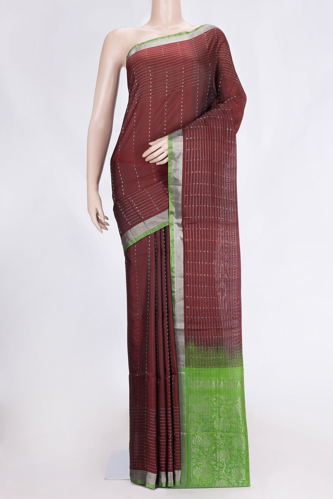 Maroon Dual Tone Uppada Silk Saree with Zari Butta on the body and Zari Border.  displayed on a mannequin