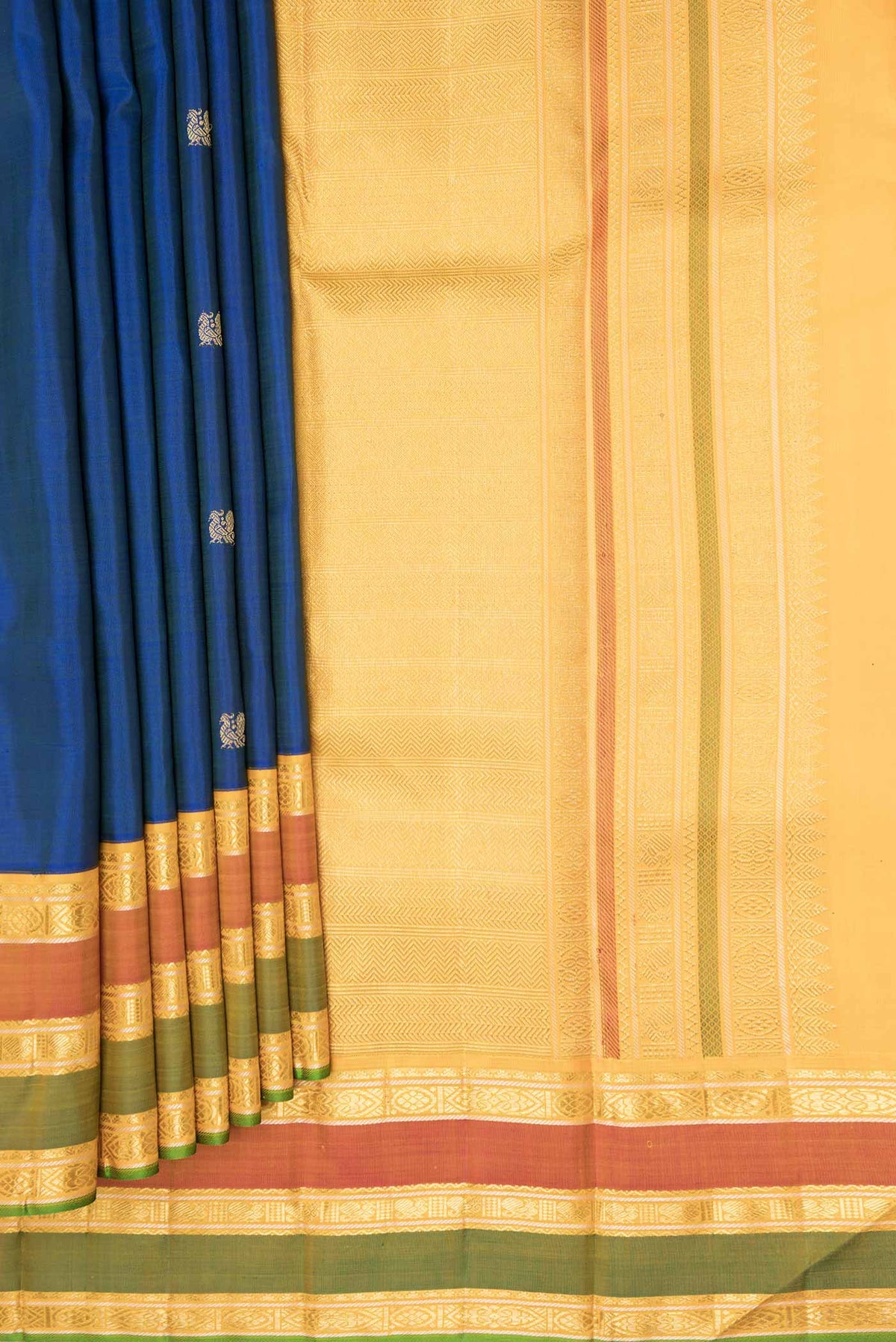Pleats and pallu of Pure Silk Pure Zari Royal Blue Dual Tone Kanchipuram Saree with Zari Butta on the body and Zari Border