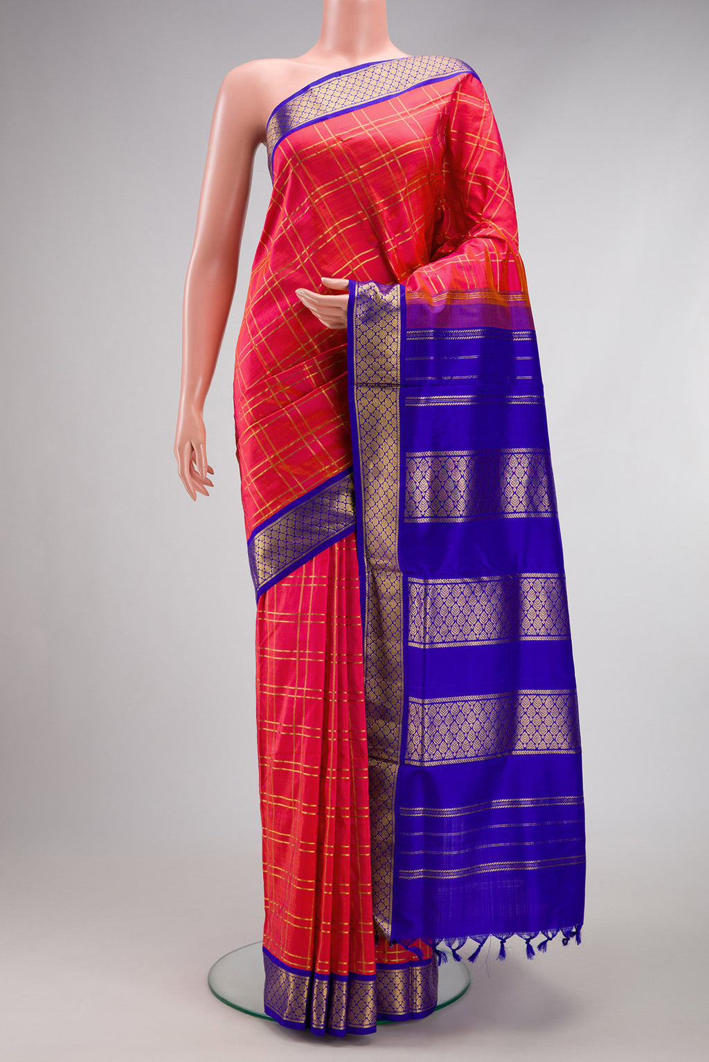 Pink Kanchipuram Silk Nine Yards Saree with Checked design on the body and Zari Border.  displayed on a mannequin