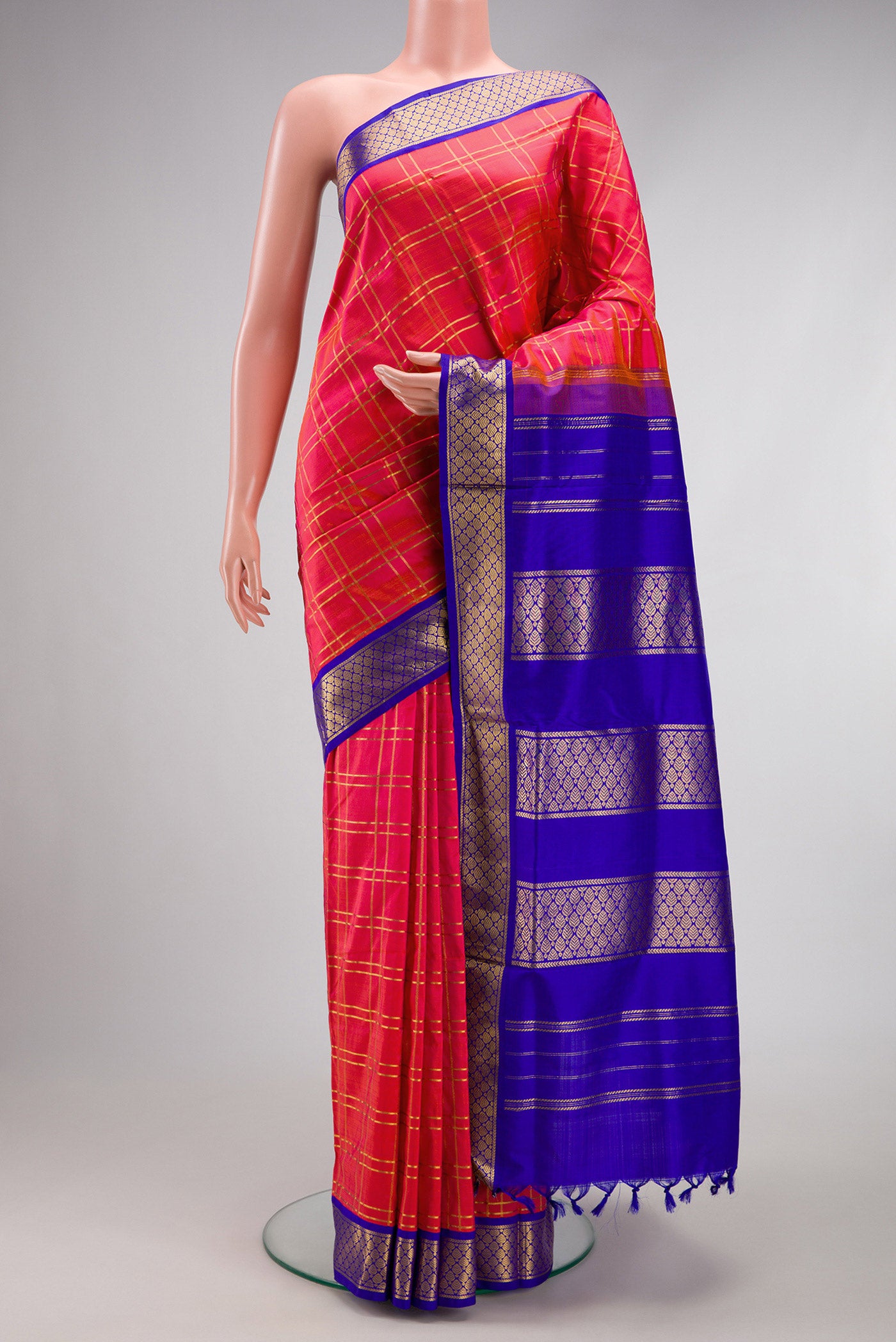 Pink Kanchipuram Silk Nine Yards Saree with Checked design on the body and Zari Border.  displayed on a mannequin