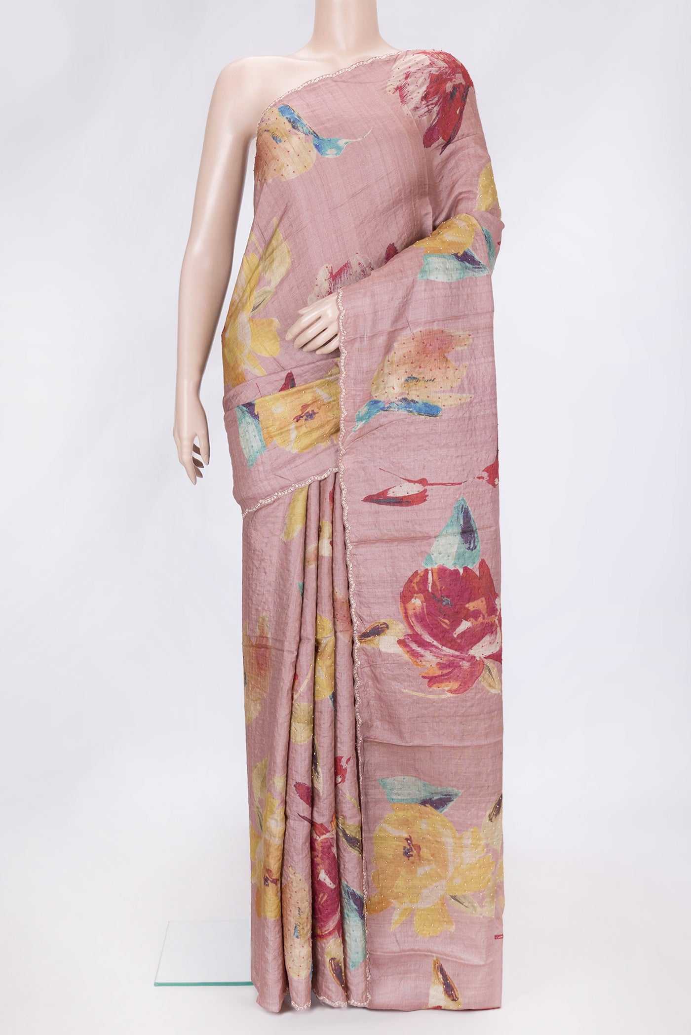 Rose Gold Dual Tone Tussar Silk Saree with Embroidery on the body and Embroidery Border.  displayed on a mannequin