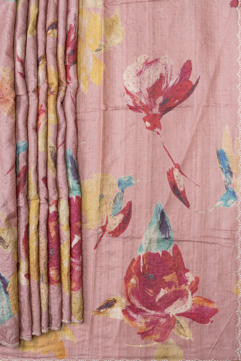 Pleats and pallu of Rose Gold Dual Tone Tussar Silk Saree with Embroidery on the body and Embroidery Border. 