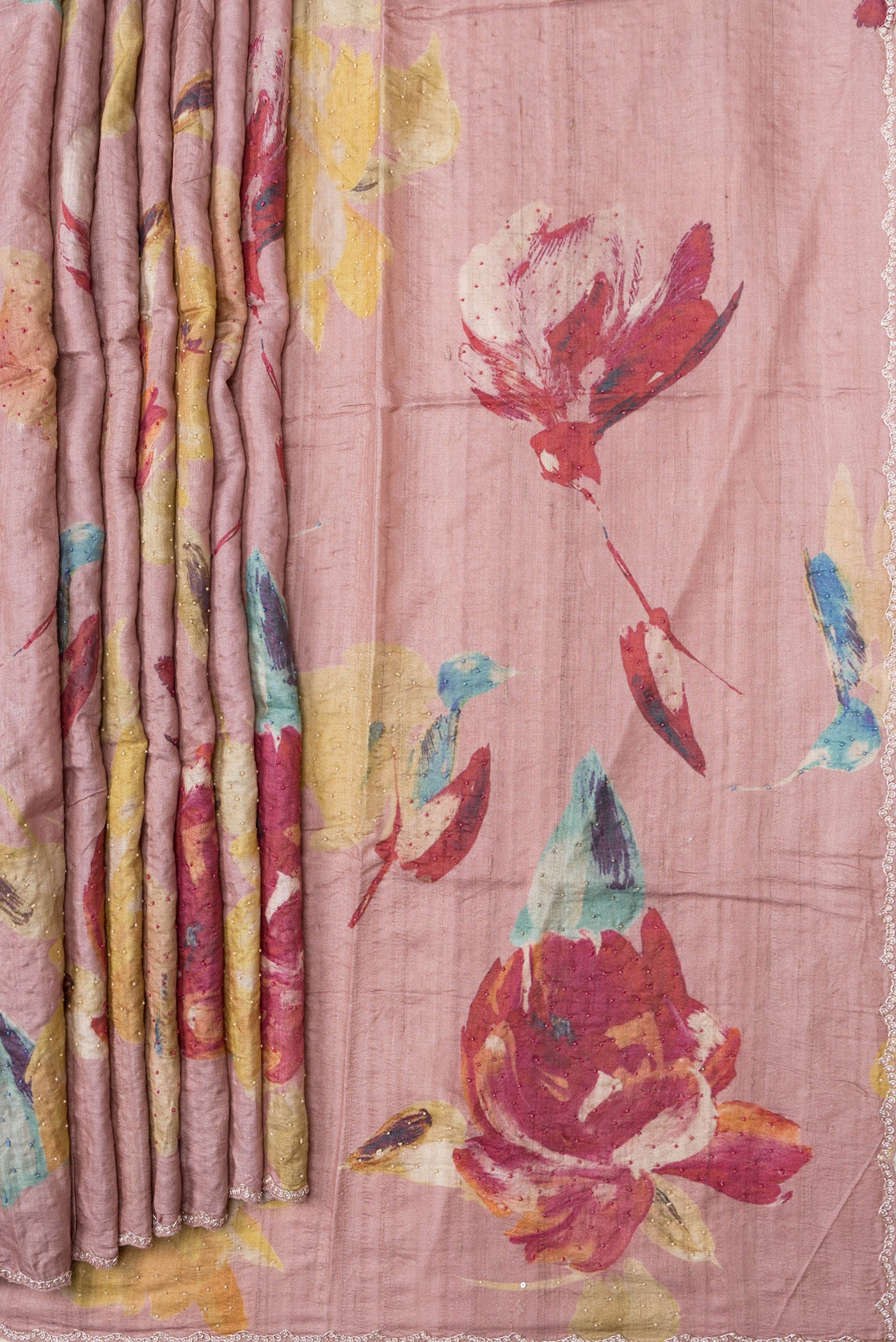 Pleats and pallu of Rose Gold Dual Tone Tussar Silk Saree with Embroidery on the body and Embroidery Border. 