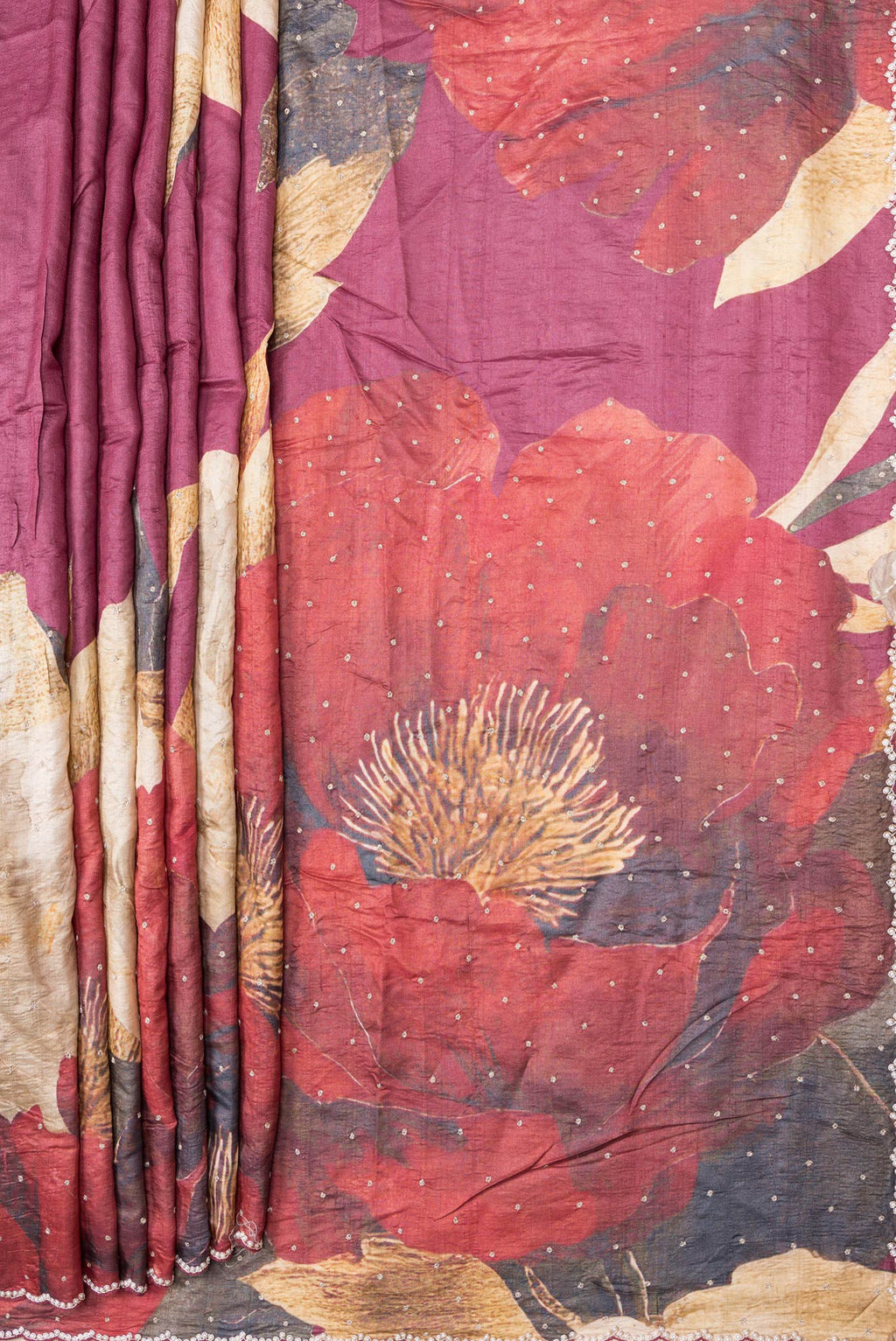 Pleats and pallu of Pink,Red and Magenta Color Tussar Silk Saree with Embroidery on the body and Embroidery Border. 