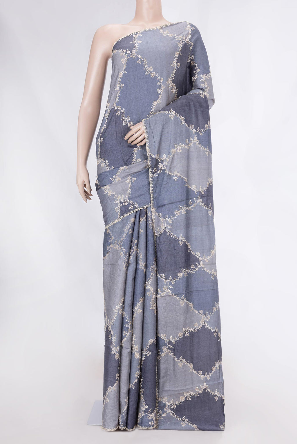 Grey Dual Tone Tussar Saree with Embroidery on the body and Embroidery Border displayed on a mannequin