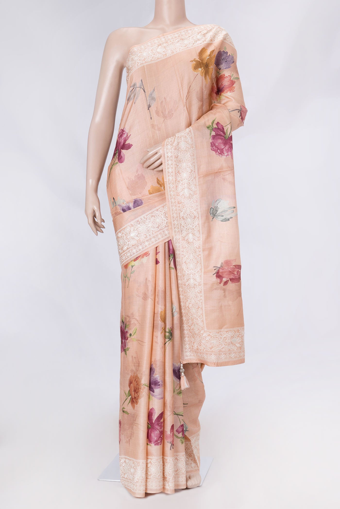 Golden Peach Dual Tone Tussar Saree with Printed design on the body and Embroidery Border displayed on a mannequin