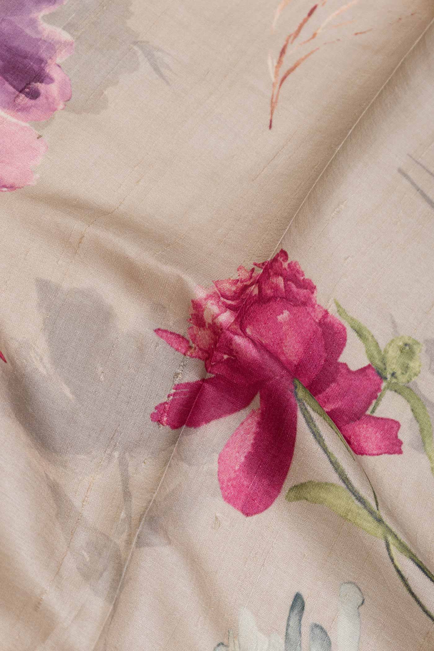 Close up of Beige Dual Tone Tussar Saree with Printed design on the body and Embroidery Border displaying folds