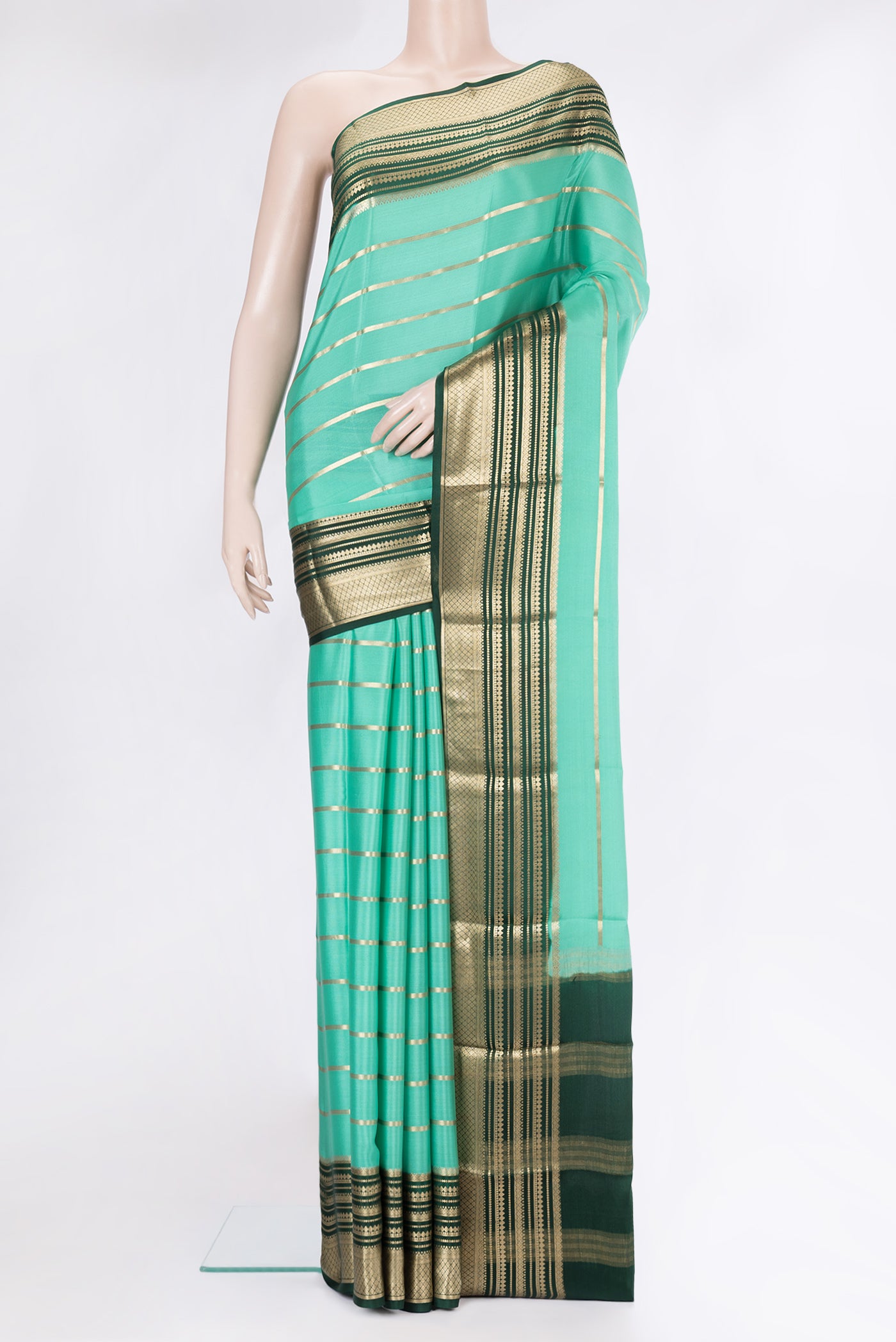 Sea Green Mysore Silk Saree with Stripes on the body and Fancy Border.  displayed on a mannequin