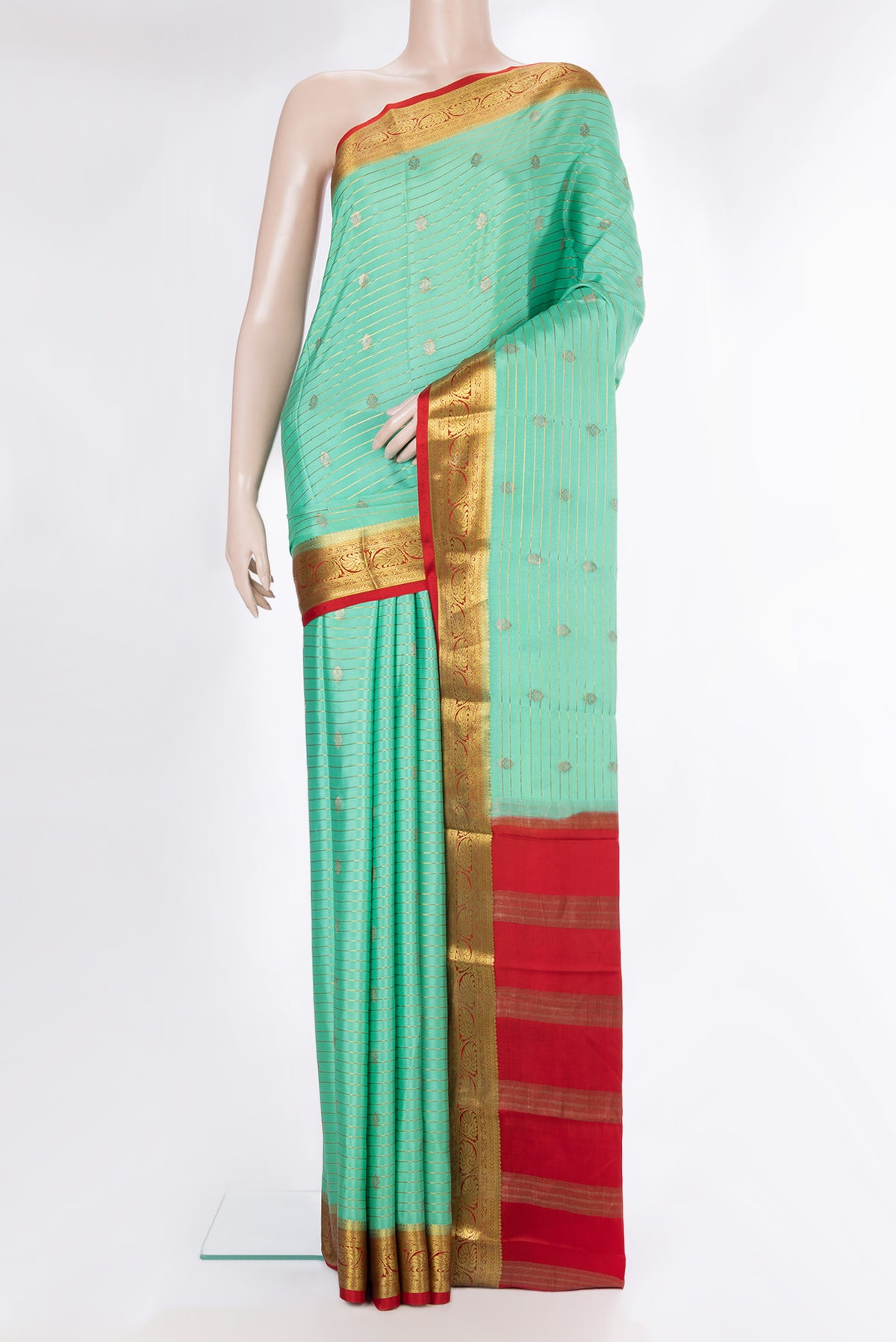 Sea Green Mysore Crepe Saree with Stripes on the body and Zari Border.  displayed on a mannequin