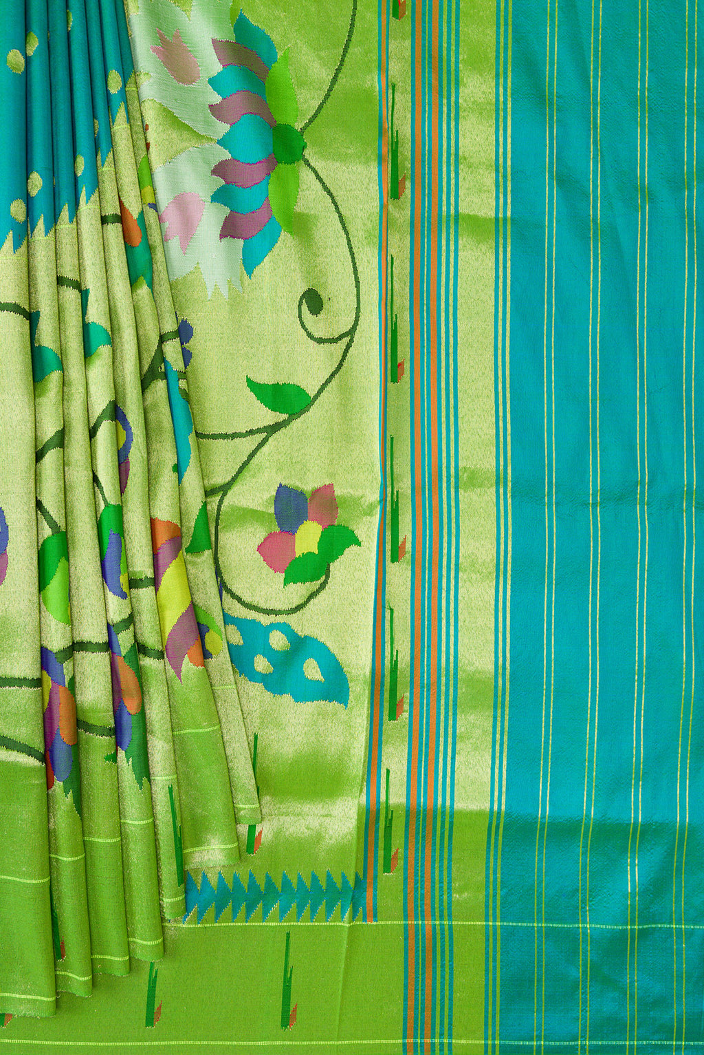 Pleats and pallu of Peacock Blue Dual Tone Paithani Silk Saree with Zari Butta on the body and Paithani Border. 