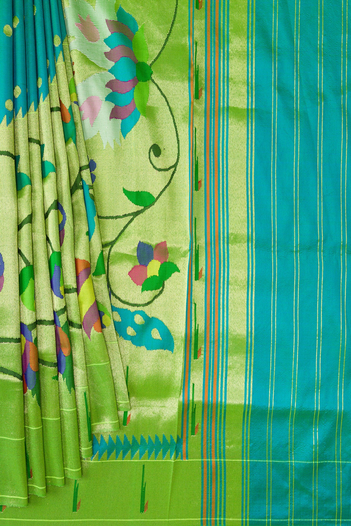 Pleats and pallu of Peacock Blue Dual Tone Paithani Silk Saree with Zari Butta on the body and Paithani Border. 