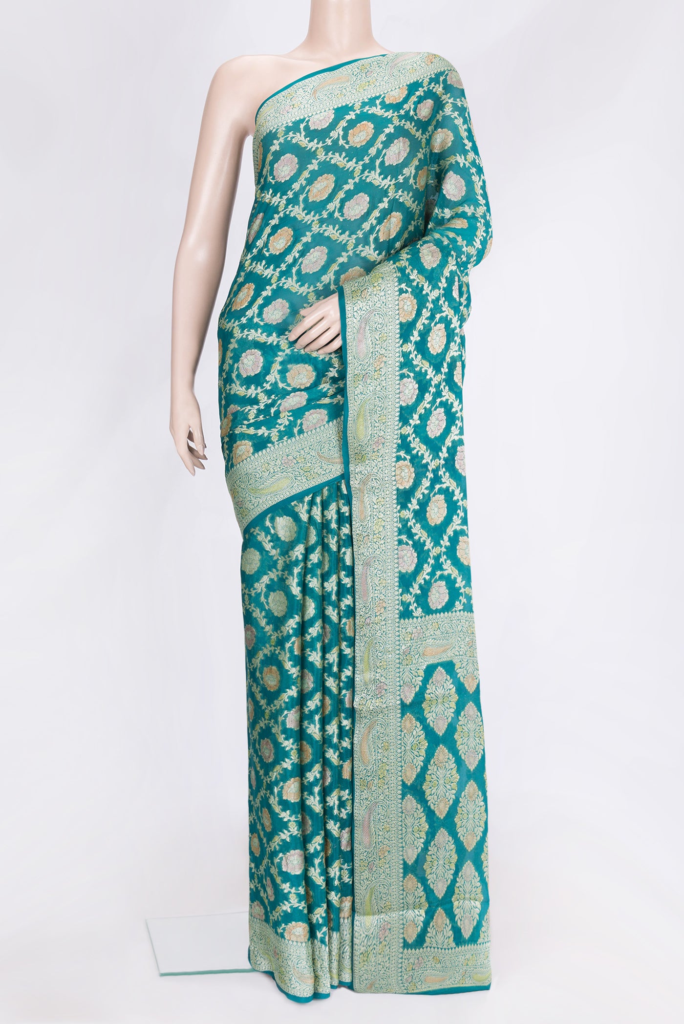 Peacock Blue Dual Tone Mysore Georgette Saree with Zari Brocade on the body and Thread Border.  displayed on a mannequin