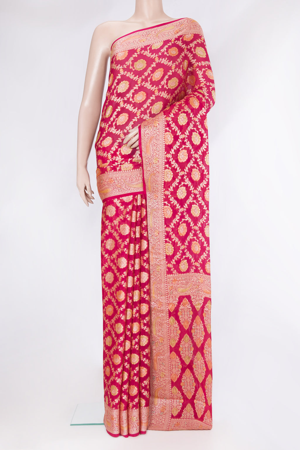 Pink Banarasi Georgette Saree with Zari Brocade on the body and Zari Border.  displayed on a mannequin