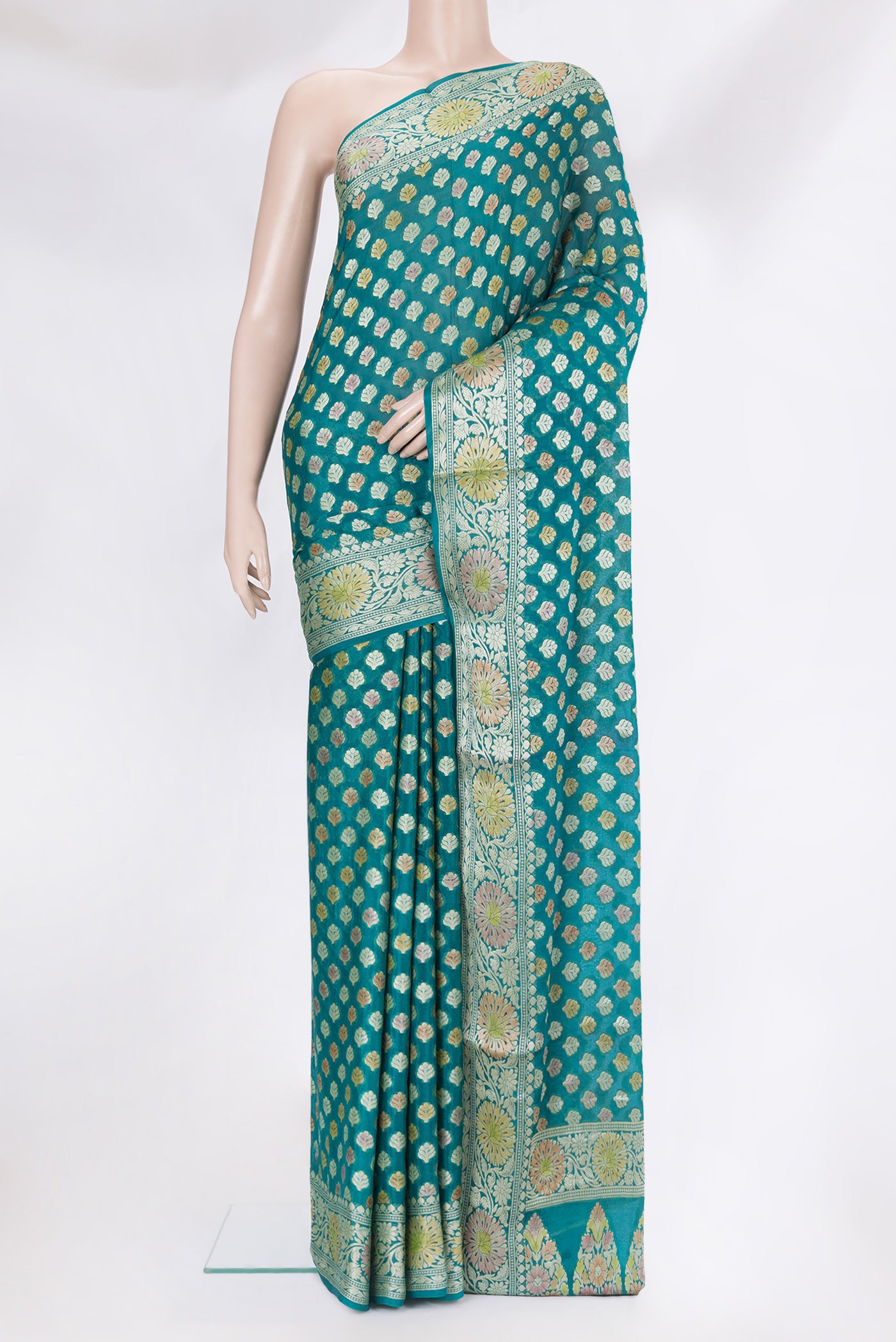 Peacock Blue Banarasi Georgette Saree with Zari Brocade on the body and Zari Border.  displayed on a mannequin