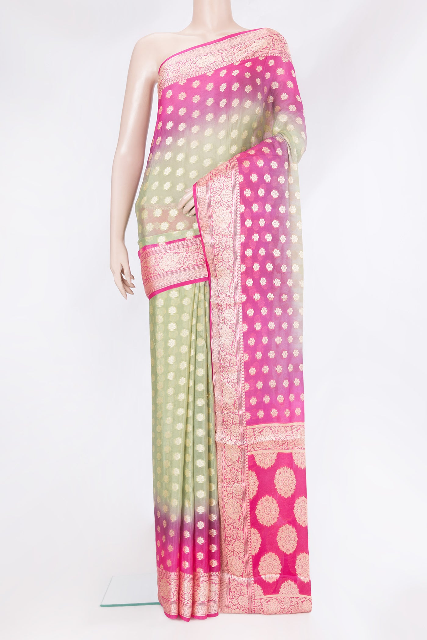 Pista Green Banarasi Georgette Saree with Zari Brocade on the body and Zari Border.  displayed on a mannequin