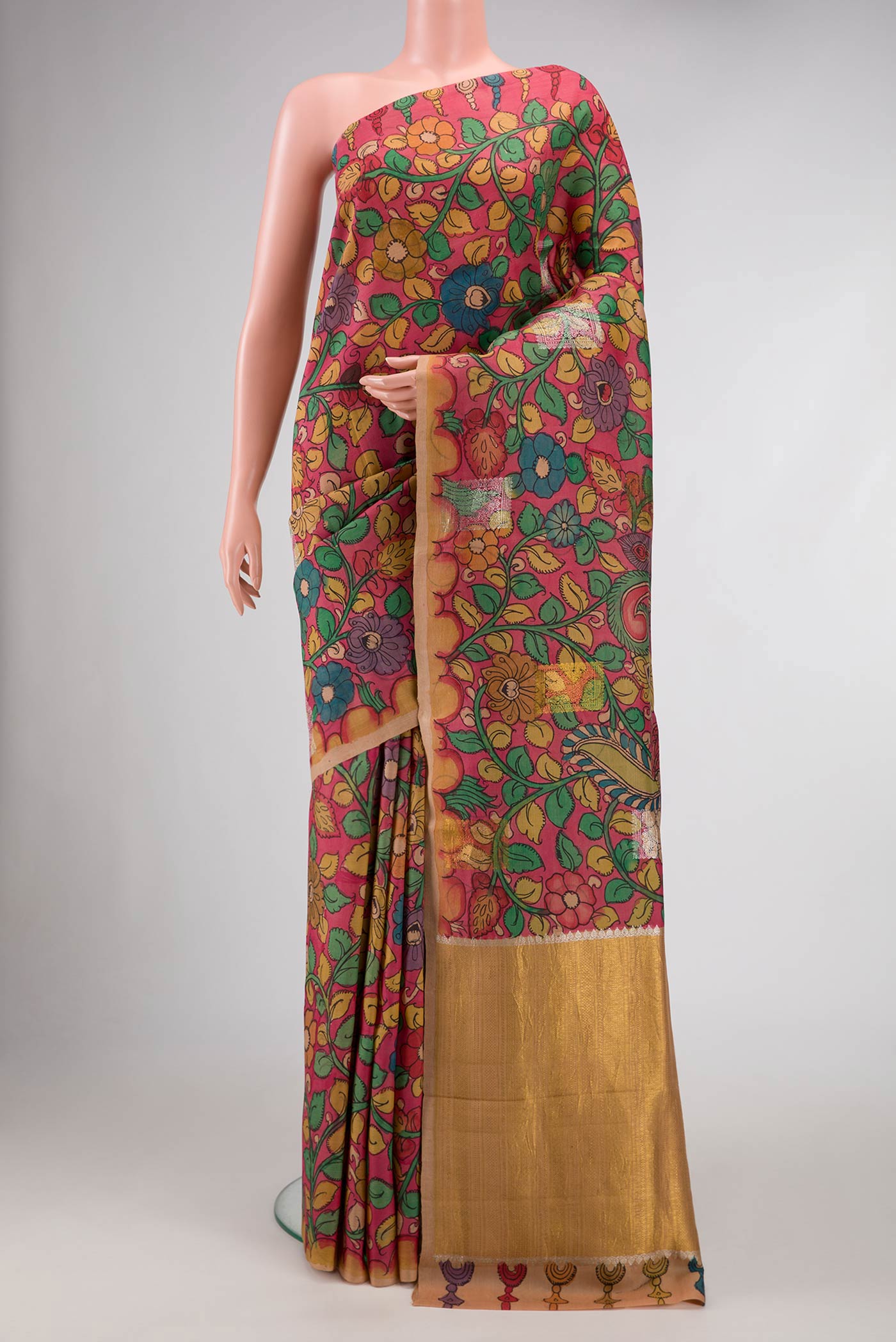 Peach Dual Tone Kanchipuram Silk Saree with kalamkari Print on the body and Fancy Border.  displayed on a mannequin