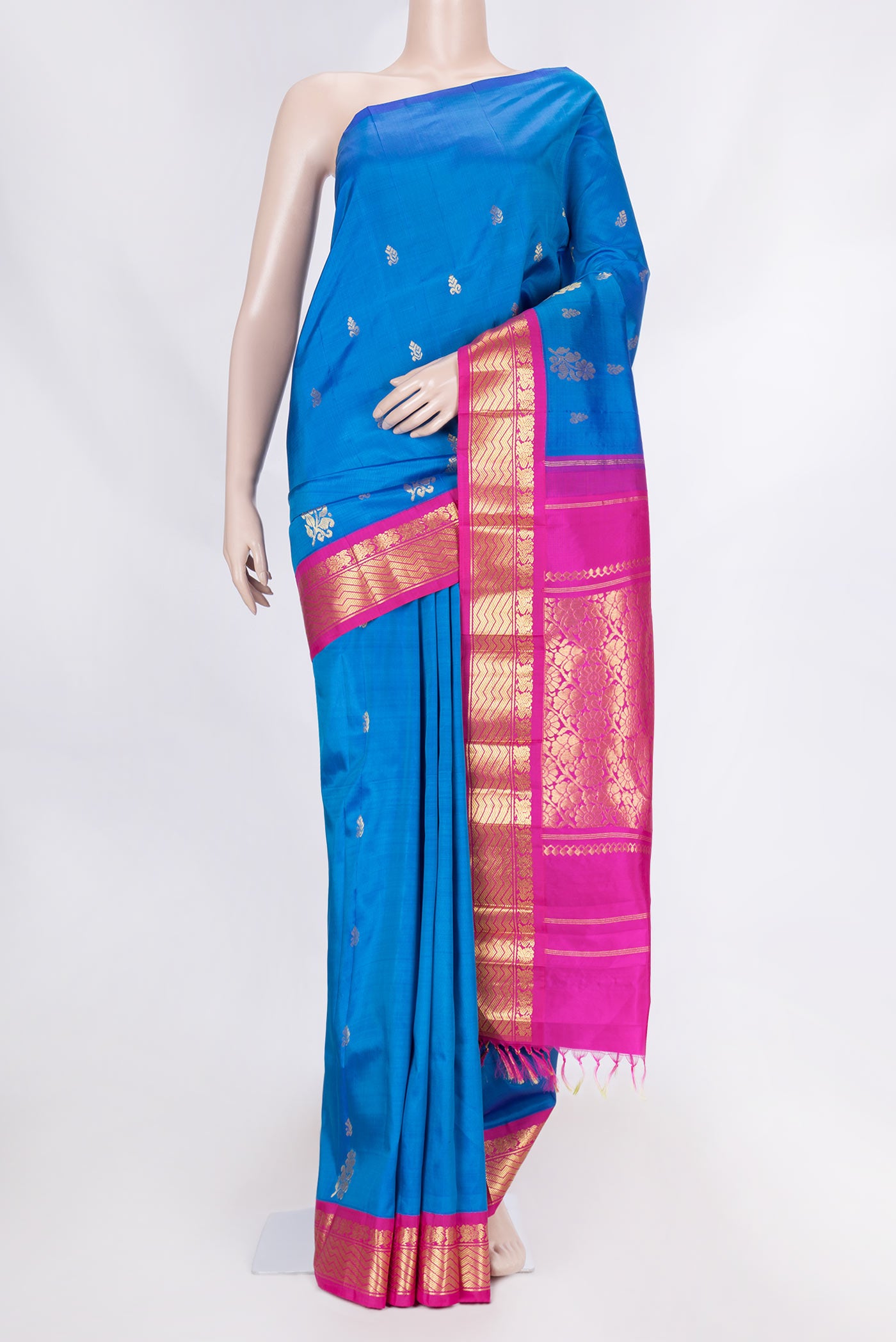 Peacock Blue Dual Tone Kanchipuram Saree with Zari Butta on the body and Zari Border displayed on a mannequin