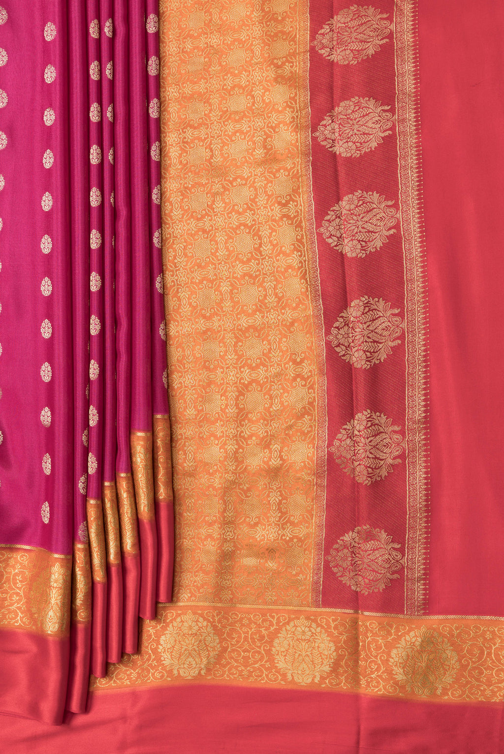 Pleats and pallu of Black and Off White Color Mysore Georgette Saree with Embroidery on the body and Embroidery Border. 