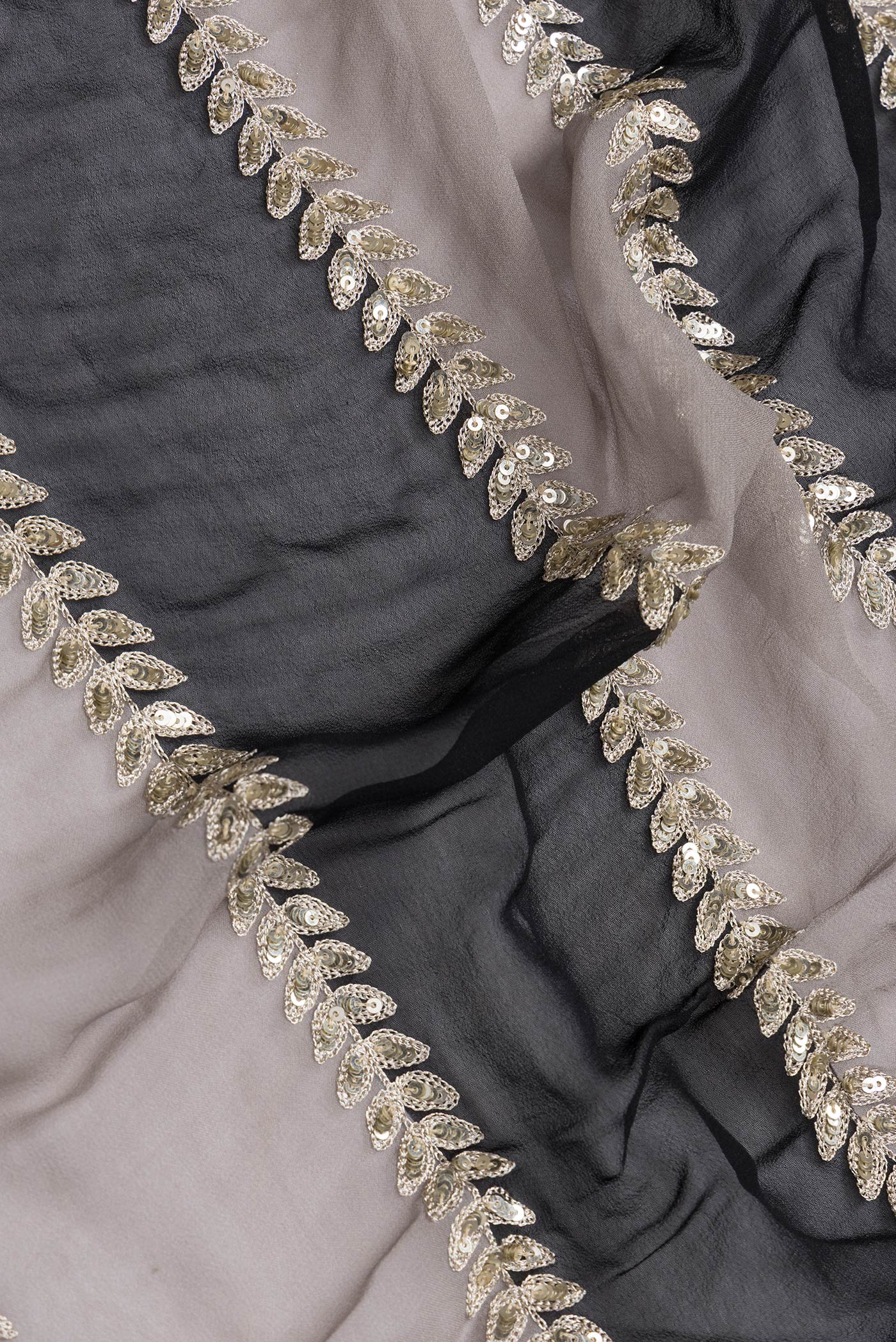 Close up of Black Dual Tone Mysore Georgette Saree with Embroidery on the body and Embroidery Border.  displaying folds