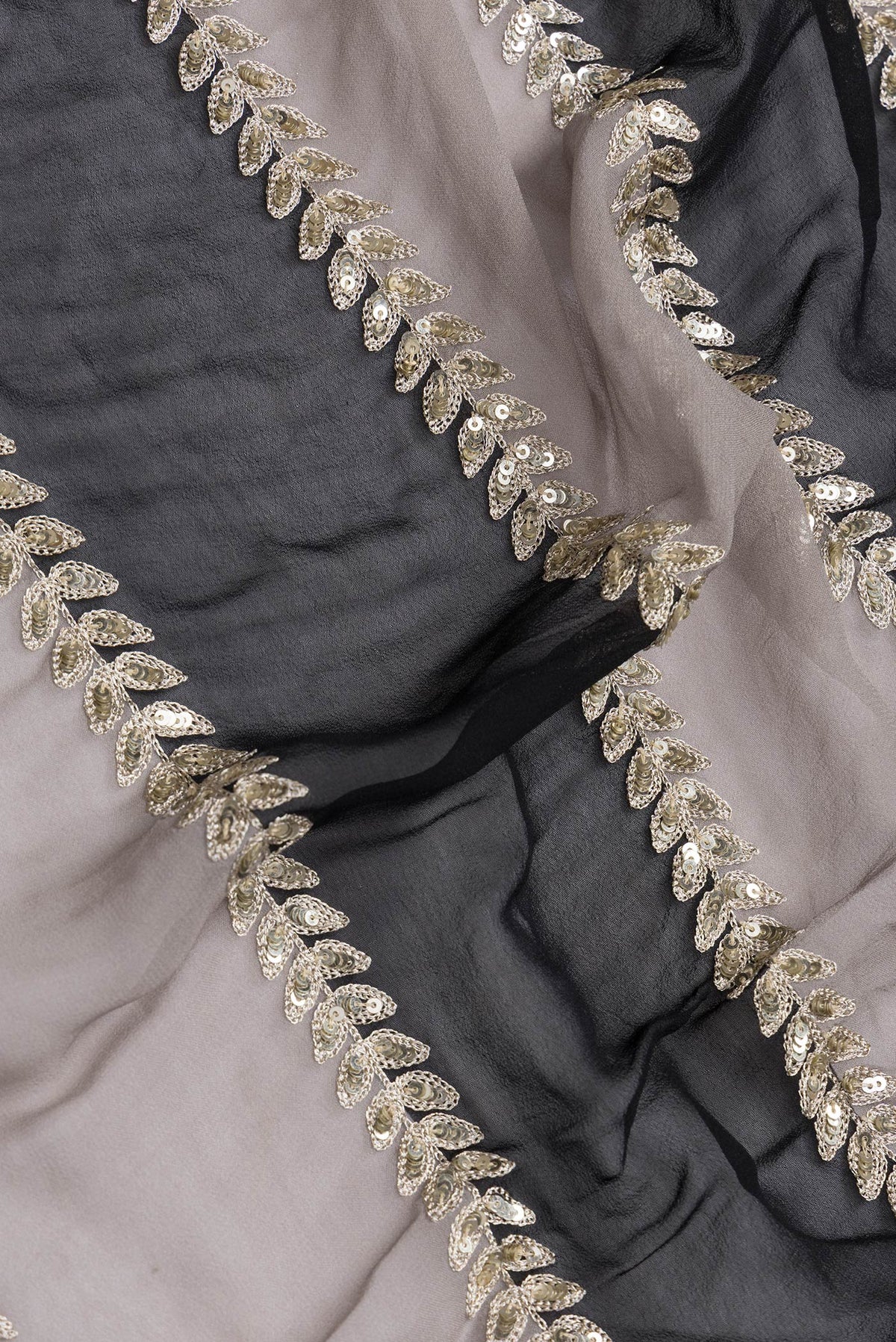 Close up of Black Dual Tone Mysore Georgette Saree with Embroidery on the body and Embroidery Border.  displaying folds