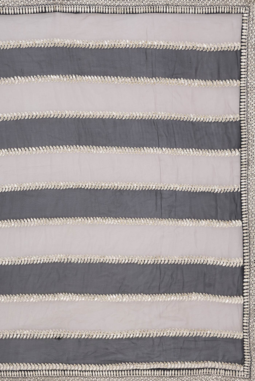 Close up image of the pallu of Black Dual Tone Mysore Georgette Saree with Embroidery on the body and Embroidery Border. 