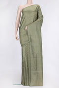 Pista Green Dual Tone Soft Silk Saree with Zari Brocade on the body and Zari Border.  displayed on a mannequin