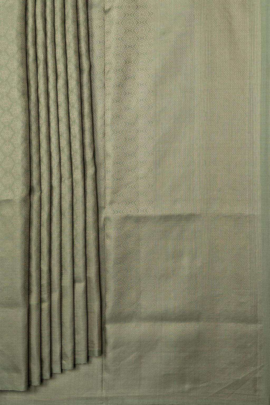 Pleats and pallu of Pista Green Dual Tone Soft Silk Saree with Zari Brocade on the body and Zari Border. 