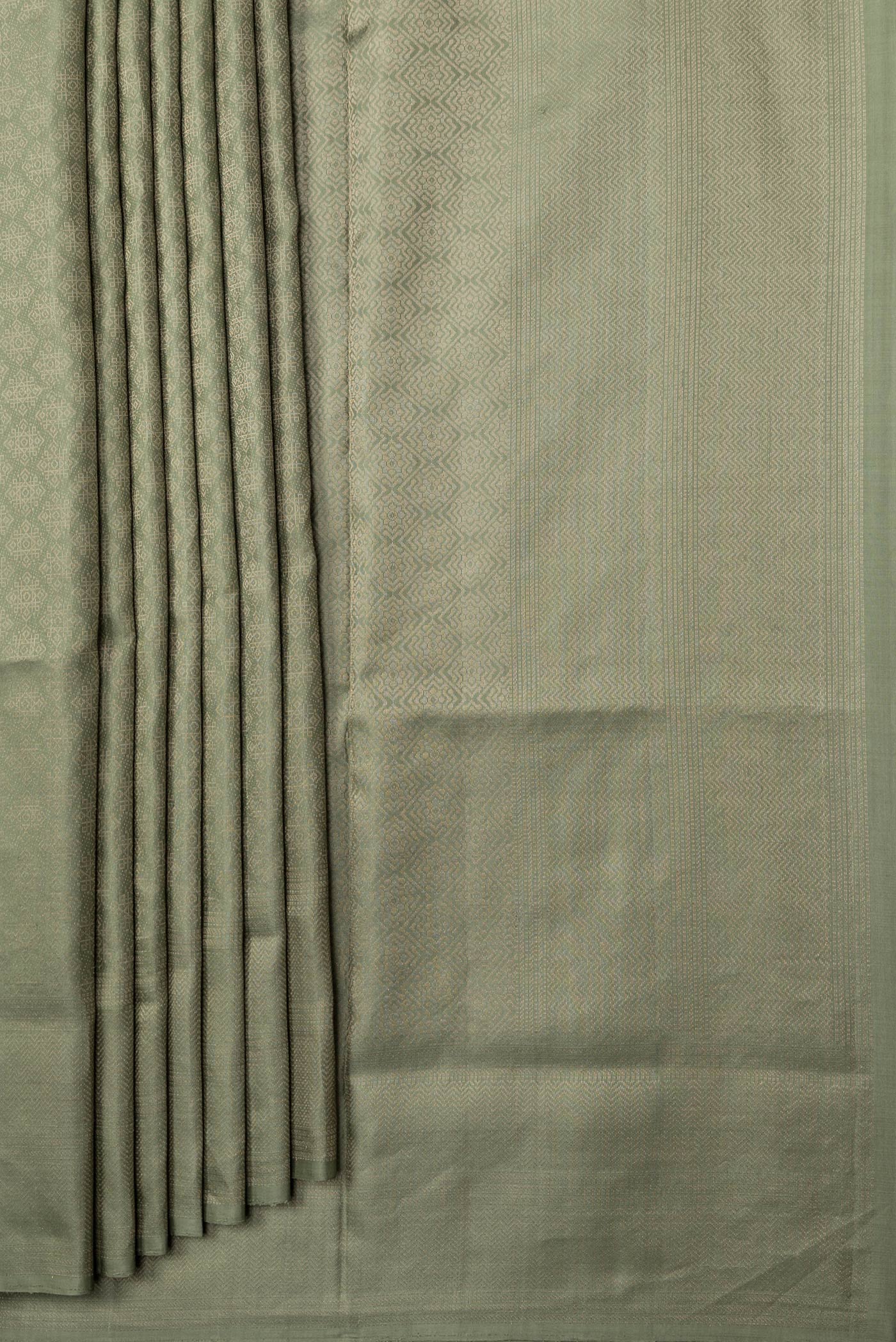 Pleats and pallu of Pista Green Dual Tone Soft Silk Saree with Zari Brocade on the body and Zari Border. 