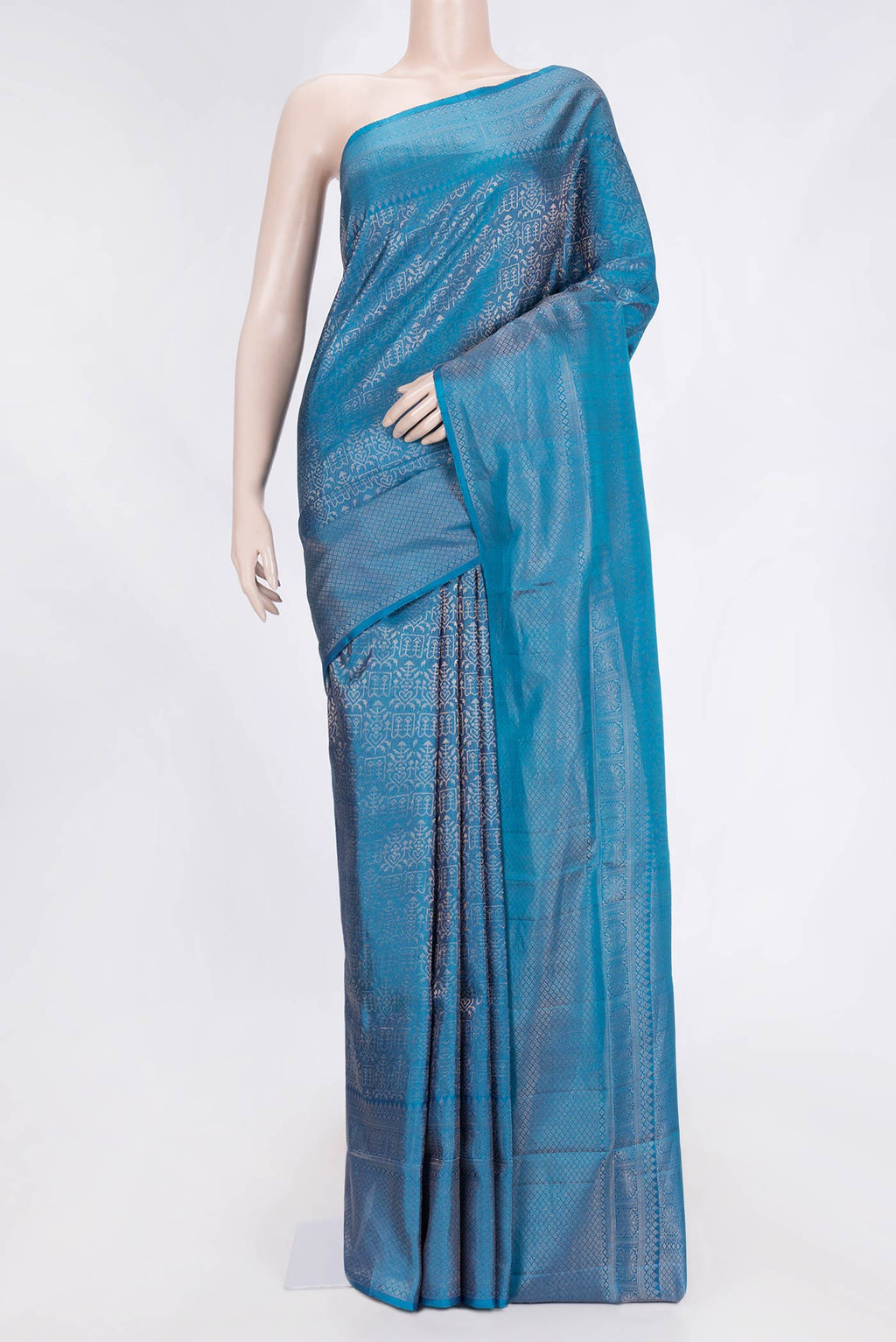 Peacock Blue Dual Tone Soft Silk Saree with Zari Brocade on the body and Zari Border.  displayed on a mannequin