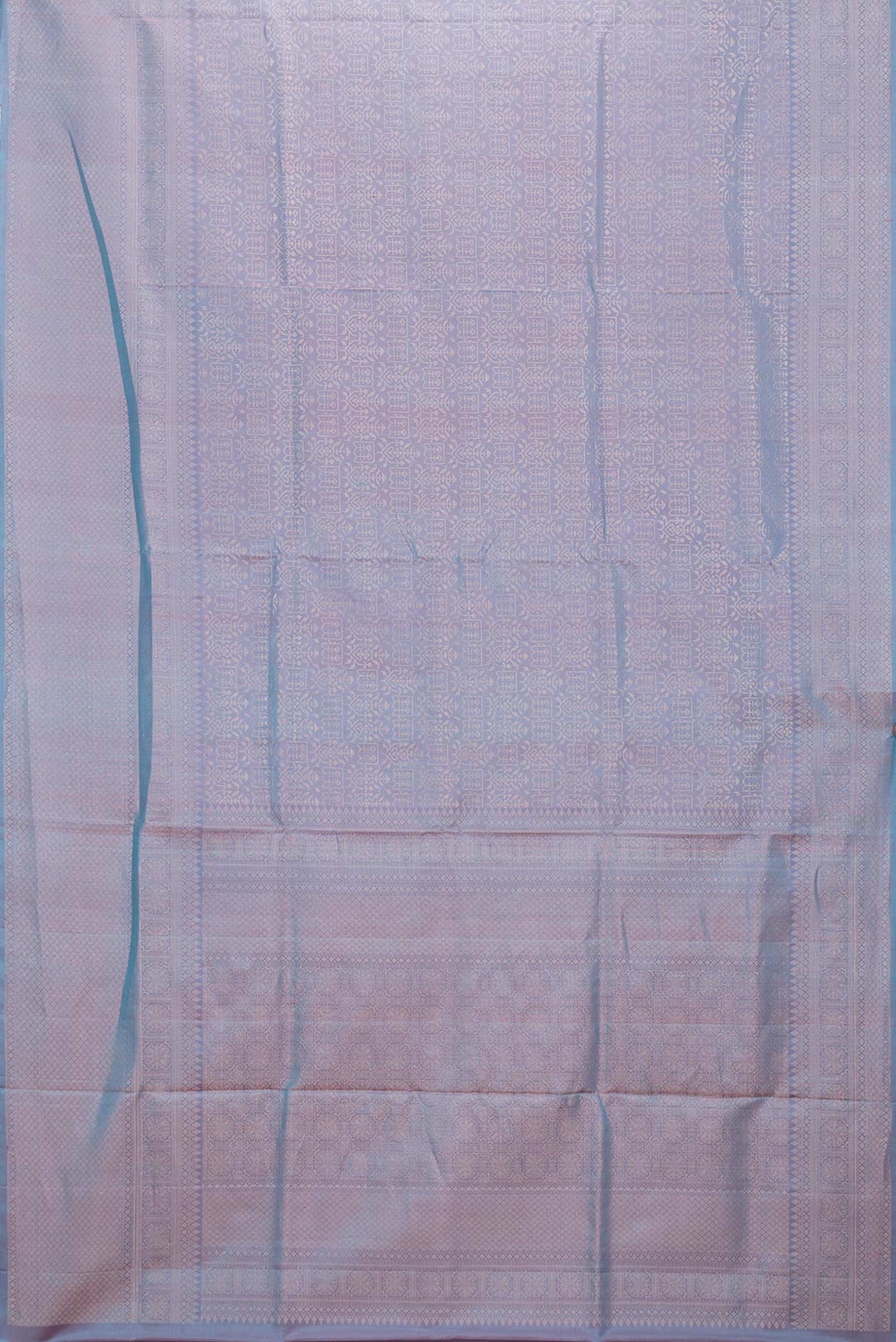 Flat view of Peacock Blue Dual Tone Soft Silk Saree with Zari Brocade on the body and Zari Border. 