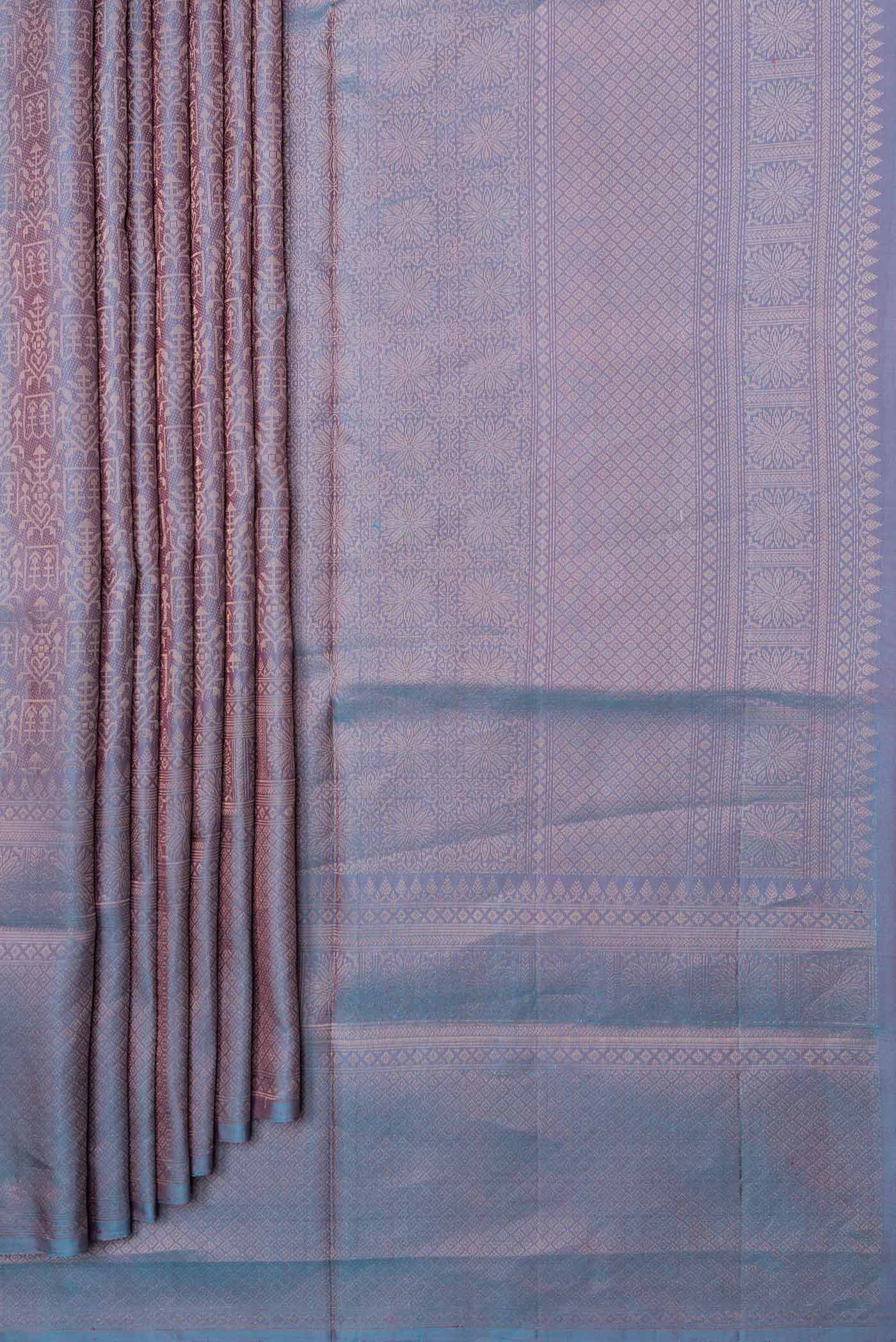 Pleats and pallu of Peacock Blue Dual Tone Soft Silk Saree with Zari Brocade on the body and Zari Border. 