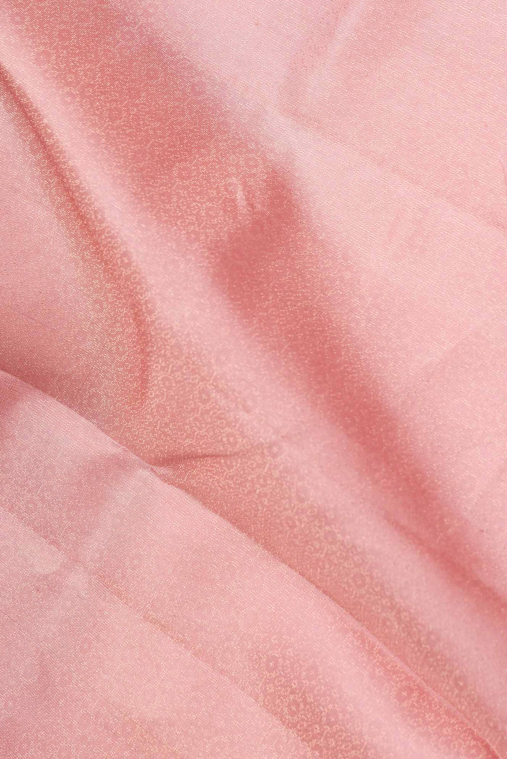 Close up of Pink Dual Tone Soft Silk Saree with Zari Brocade on the body and Zari Border.  displaying folds