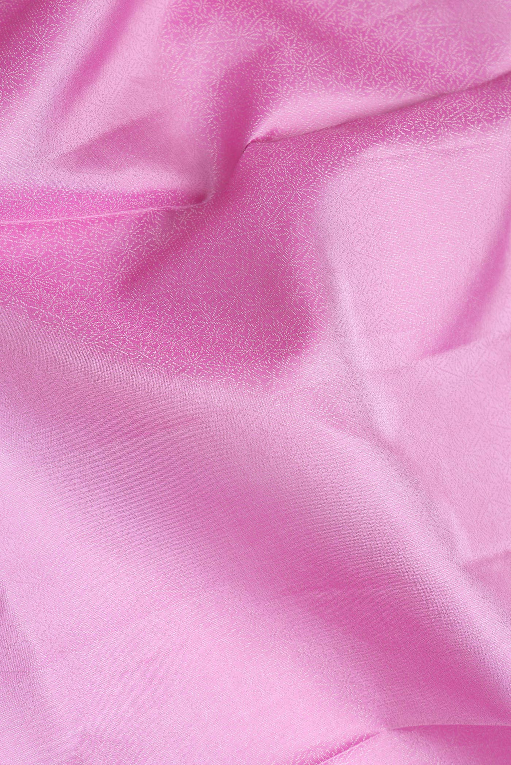Close up of Pink Dual Tone Soft Silk Saree with Zari Brocade on the body and Zari Border.  displaying folds