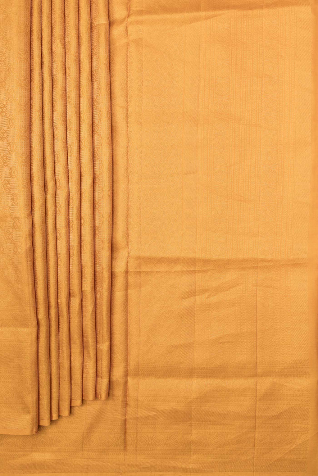 Pleats and pallu of Mustard Dual Tone Soft Silk Saree with Zari Brocade on the body and Zari Border. 