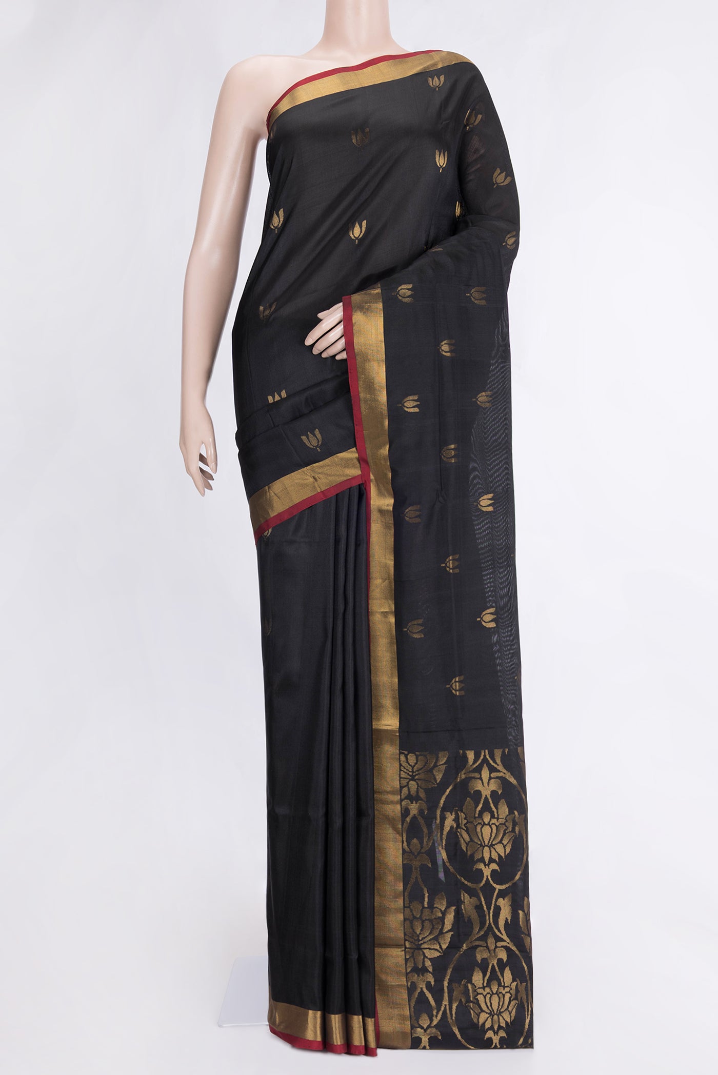 Black Dual Tone Uppada Silk Saree with Zari Butta on the body and Zari Border.  displayed on a mannequin