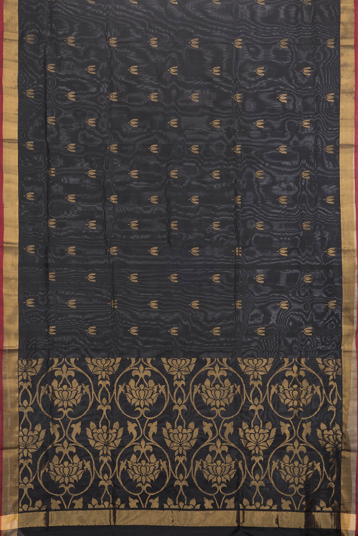 Flat view of Black Dual Tone Uppada Silk Saree with Zari Butta on the body and Zari Border. 